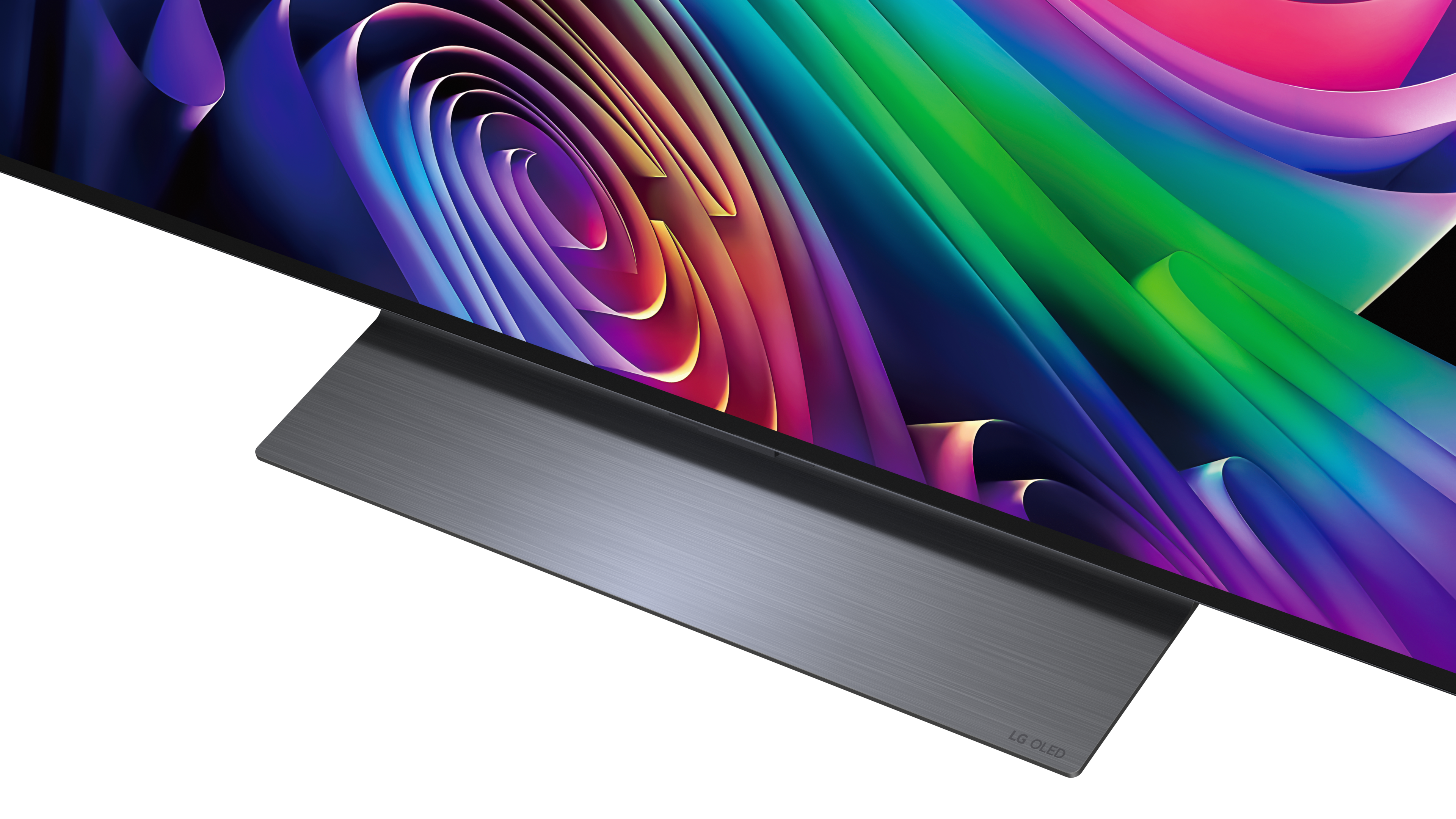 Zbliżenie na telewizor LG OLED z kolorowym, abstrakcyjnym tłem i srebrną podstawą.