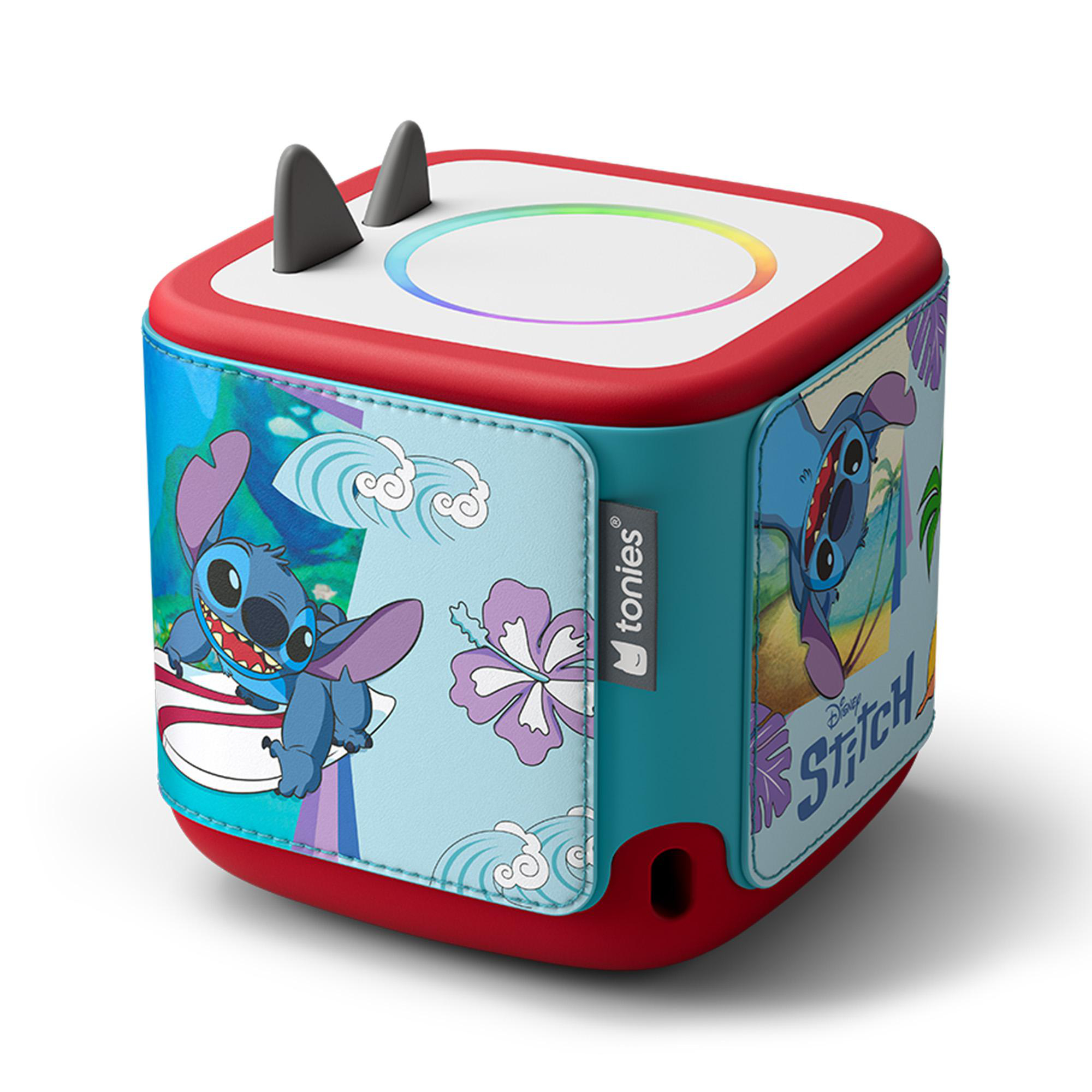 Ein blauer Würfel mit Stitch-Motiv, roten Kanten und Ohren oben. Bunte Lichter auf der Oberseite.