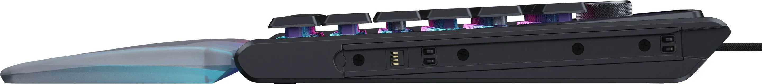 Tastiera nera con tasti illuminati RGB e poggiapolsi trasparente.