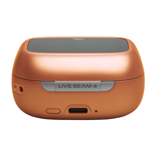 Pomarańczowe etui ładujące do słuchawek z logo JBL i portem USB-C.