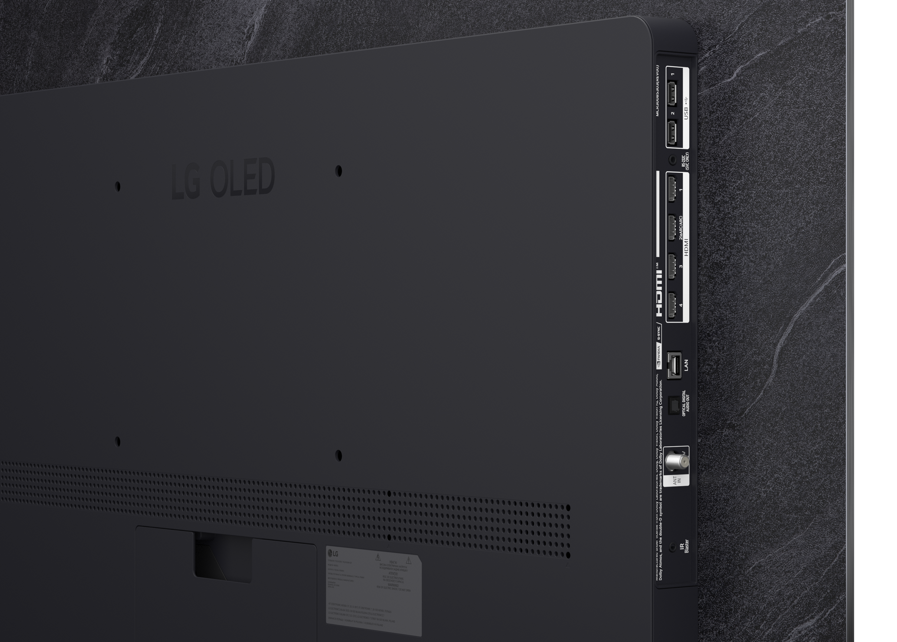 Tył czarnego telewizora LG OLED z portami: HDMI, USB, LAN, Audio Optyczne.