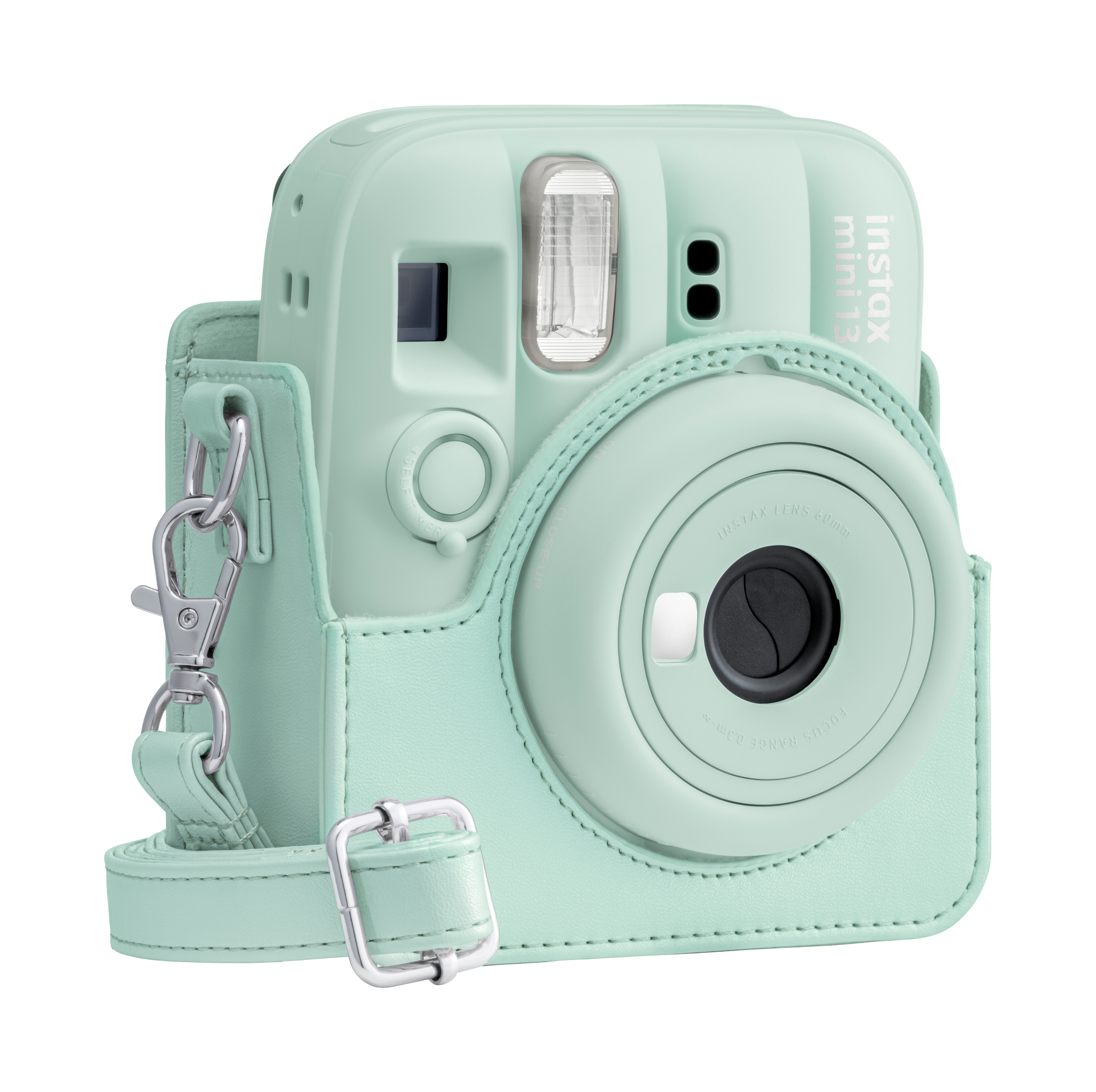 Egy mentazöld Instax Mini 13 kamera hozzáillő tokkal és szíjjal.