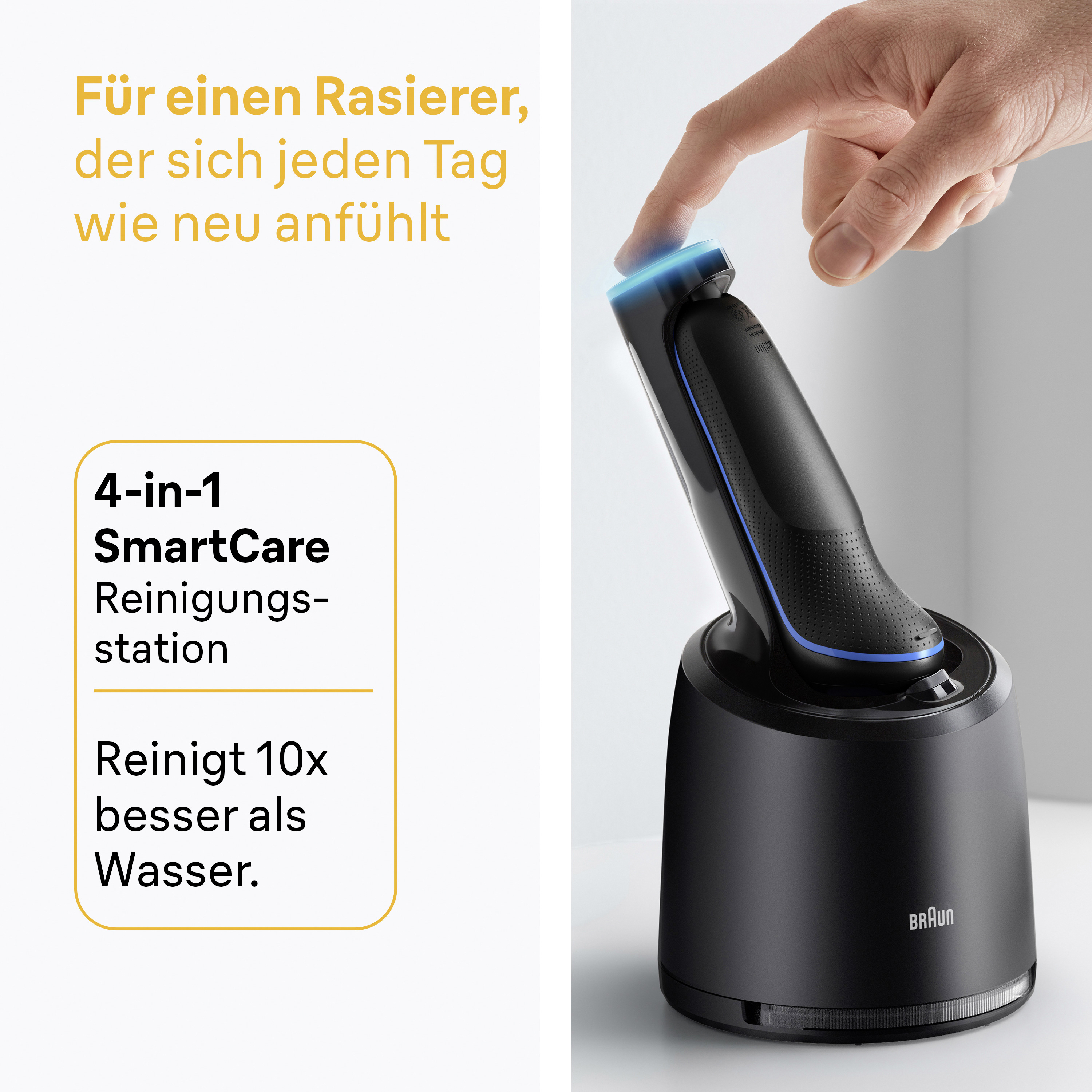 Ein Mann berührt einen schwarzen Rasierer auf einer Ladestation mit blauer Beleuchtung.