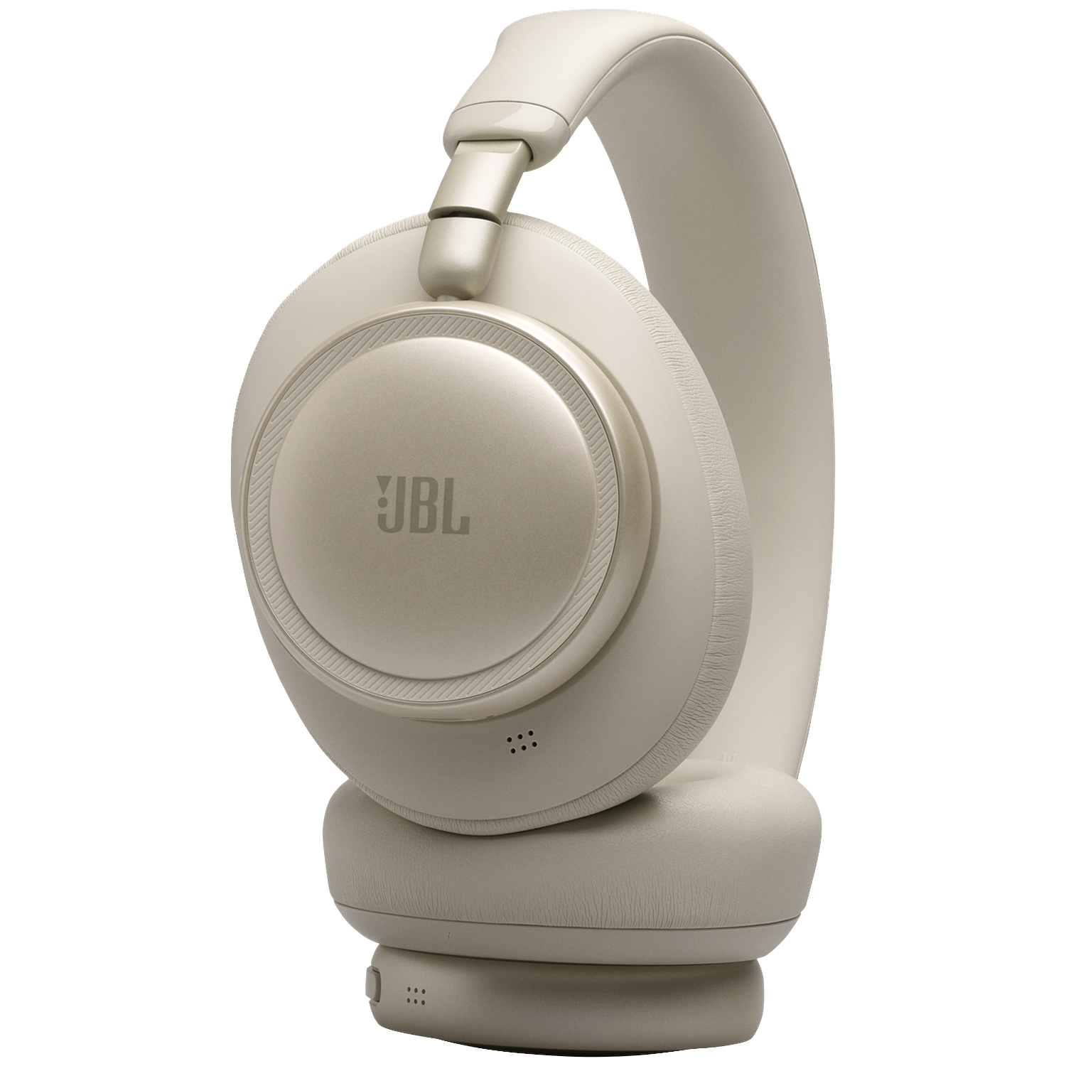 Un casque JBL couleur crème avec des coussinets et un arceau.