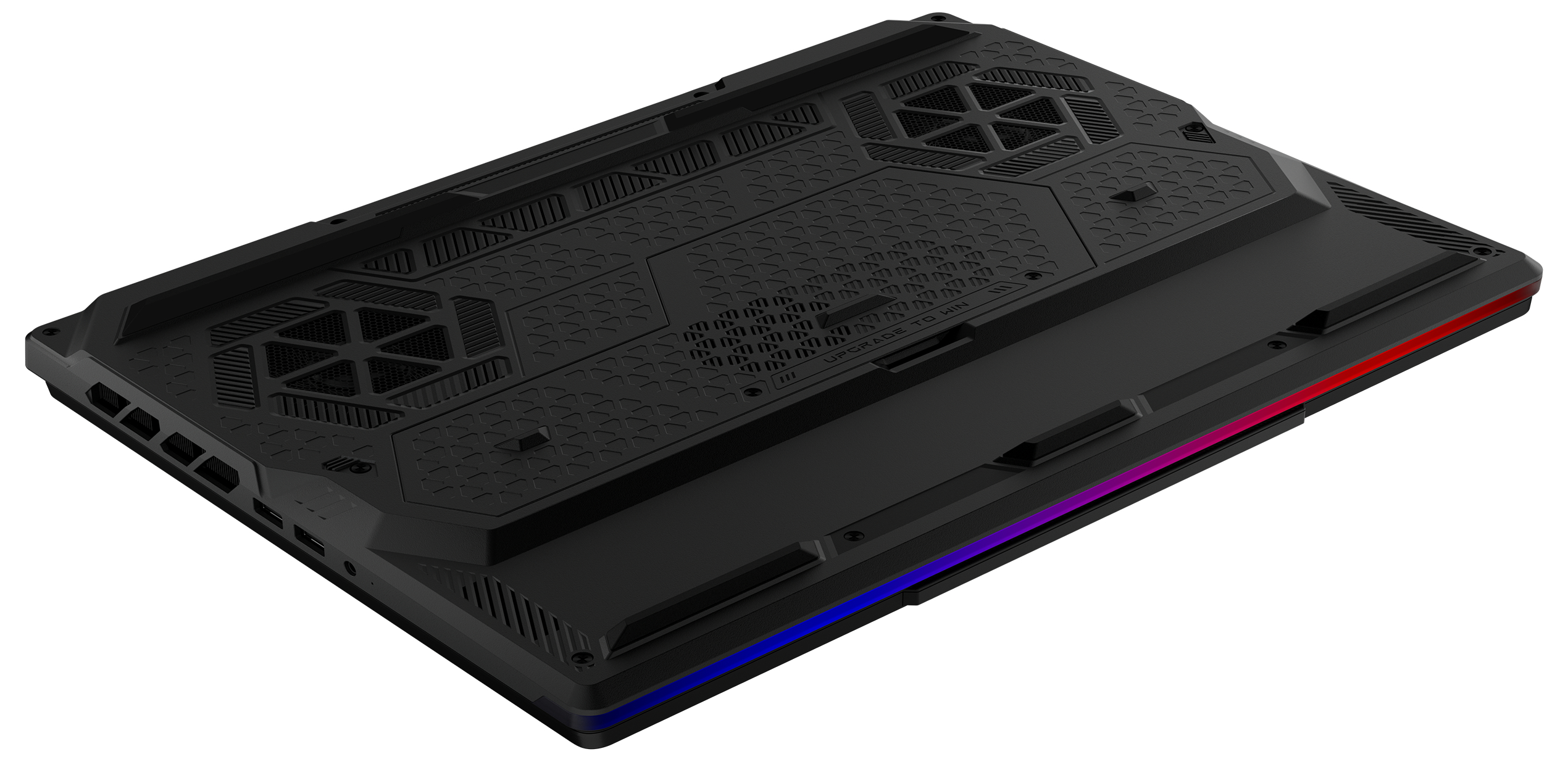 Unterseite eines schwarzen Gaming-Laptops. Texturierte Oberfläche mit Lüftungsschlitzen und RGB-Beleuchtung.