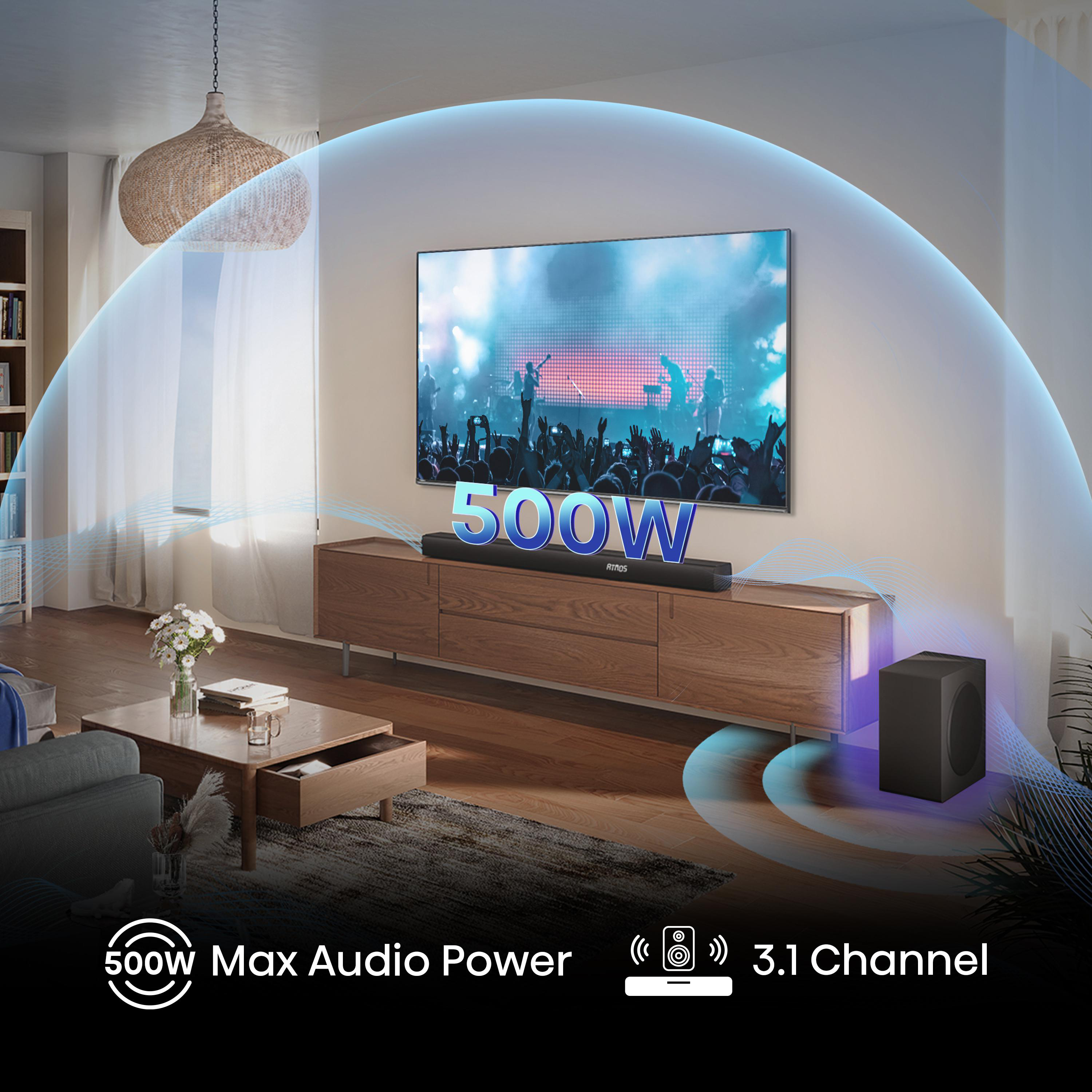 Ein Wohnzimmer mit TV, Soundbar, Subwoofer und 500W Max Audioleistung.