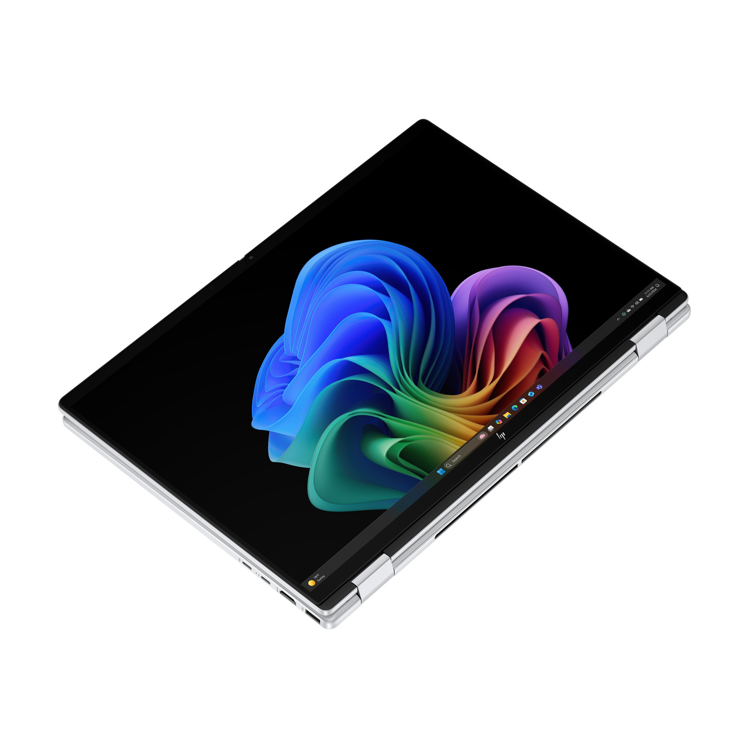 Un laptop argentato aperto con uno sfondo colorato visualizzato sullo schermo.