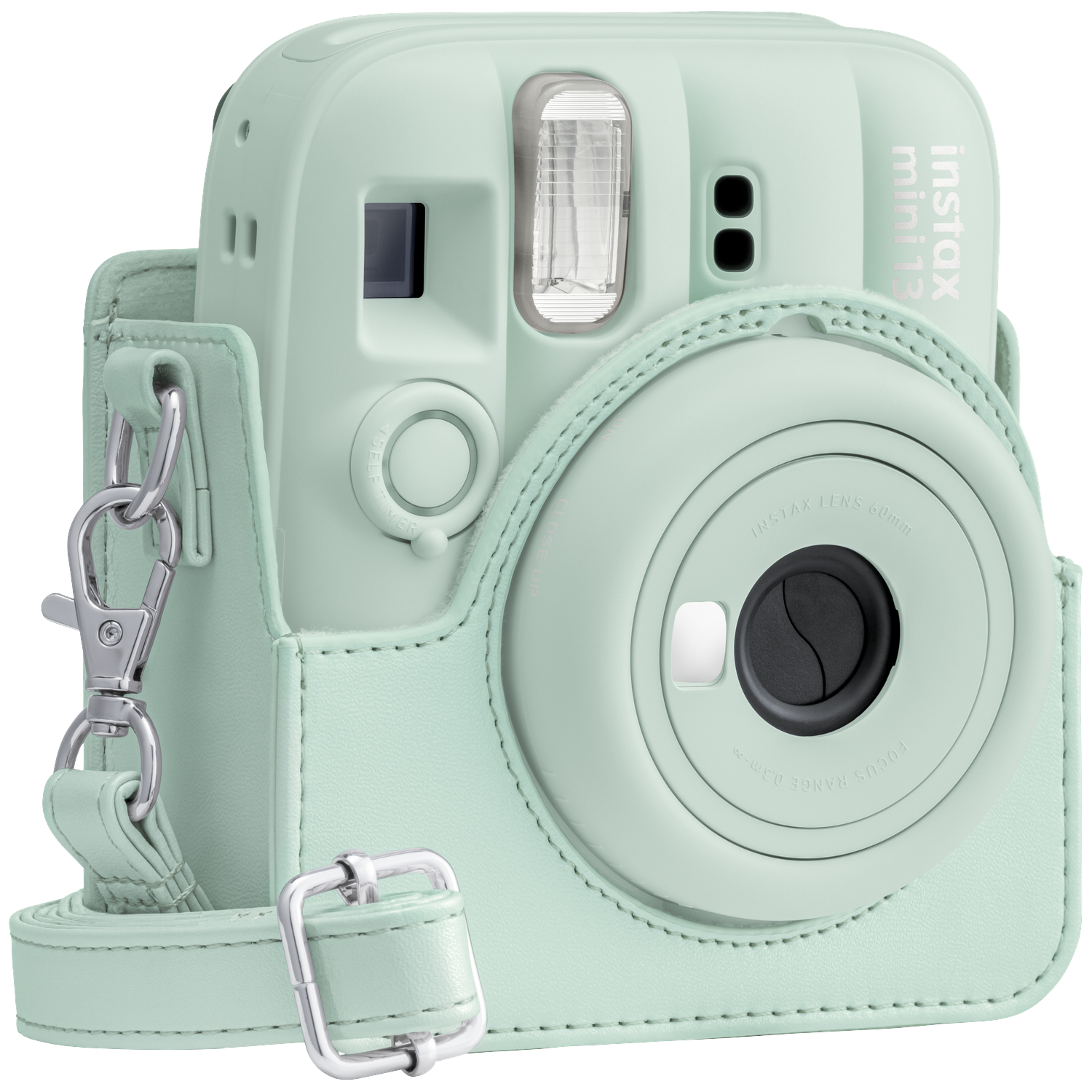 A mint green instant camera with a matching leather case and strap.