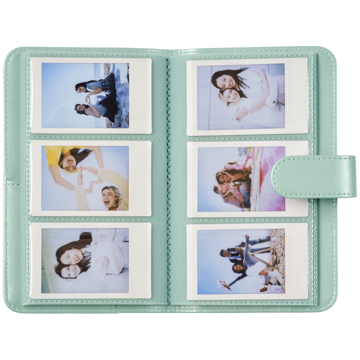 A mint green photo album binder holding six Polaroid photos of young women.