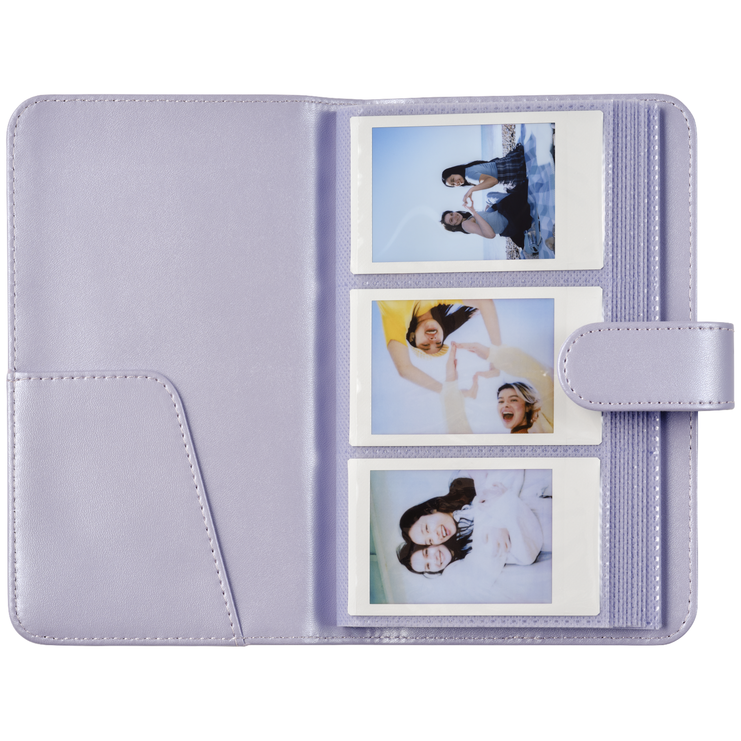 A lavender photo album open, showing three instax photos of smiling young women.