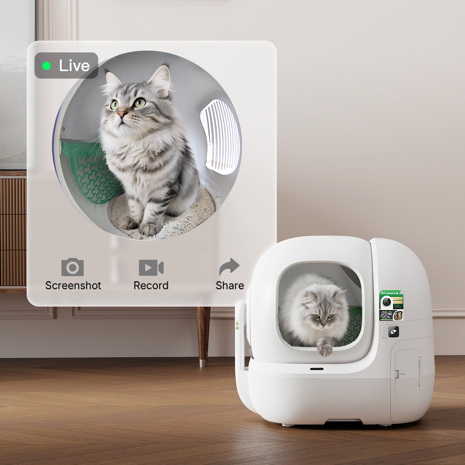 A cat sits in a modern, white litter box with a live video feed displayed.