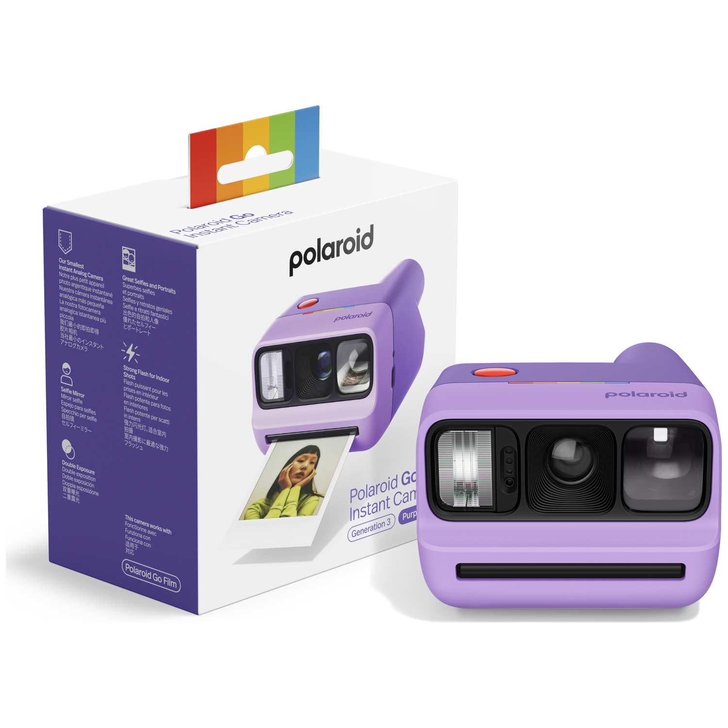 A purple Polaroid Go instant camera with packaging and a developed photo.