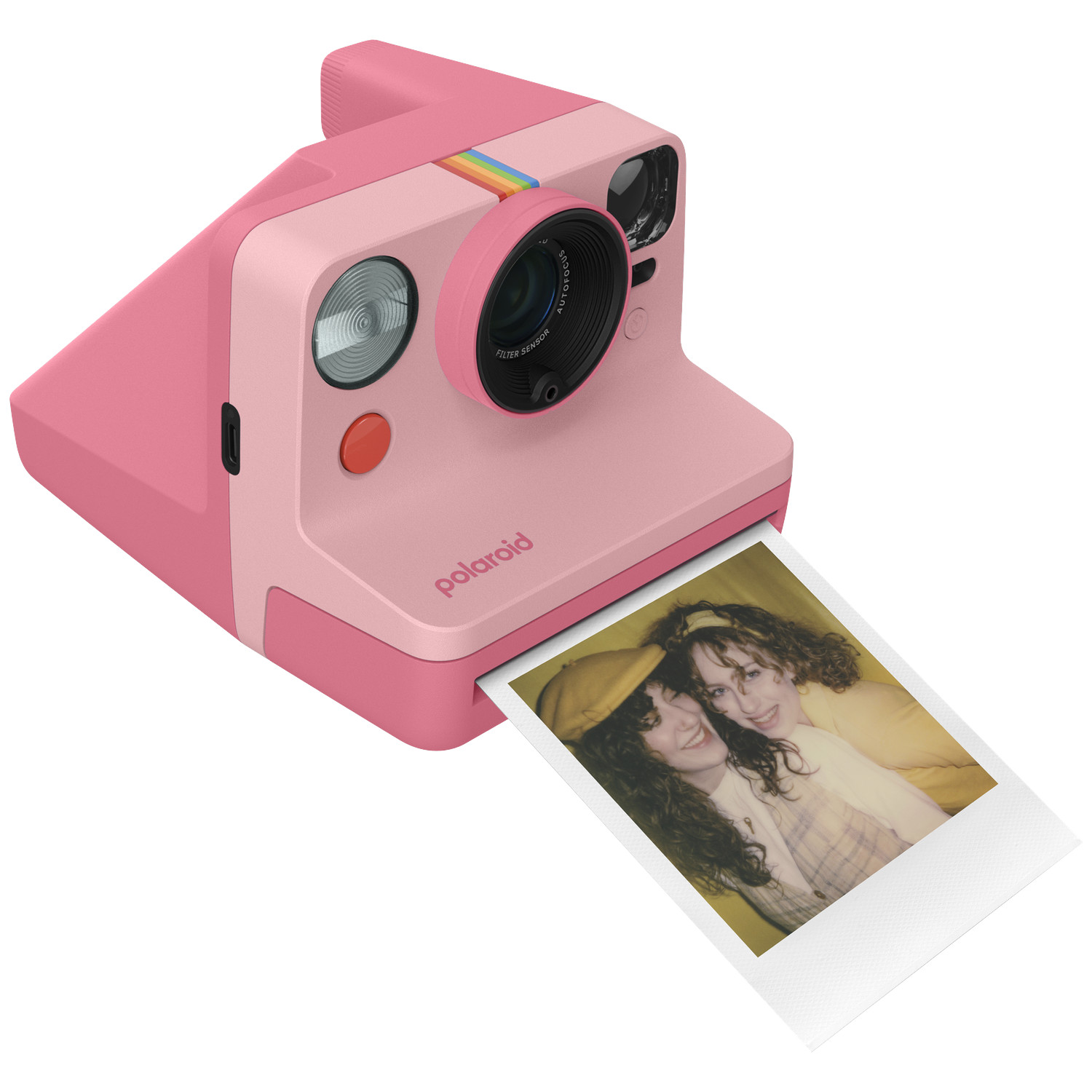 Een roze Polaroid camera met een foto van twee lachende vrouwen.