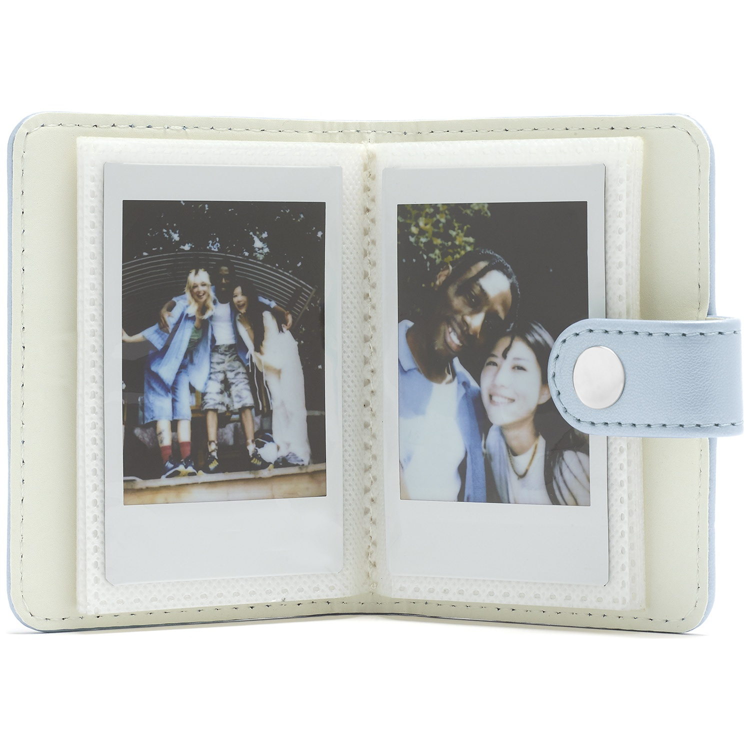 Light blue photo album with two instant photos: a group and a couple.