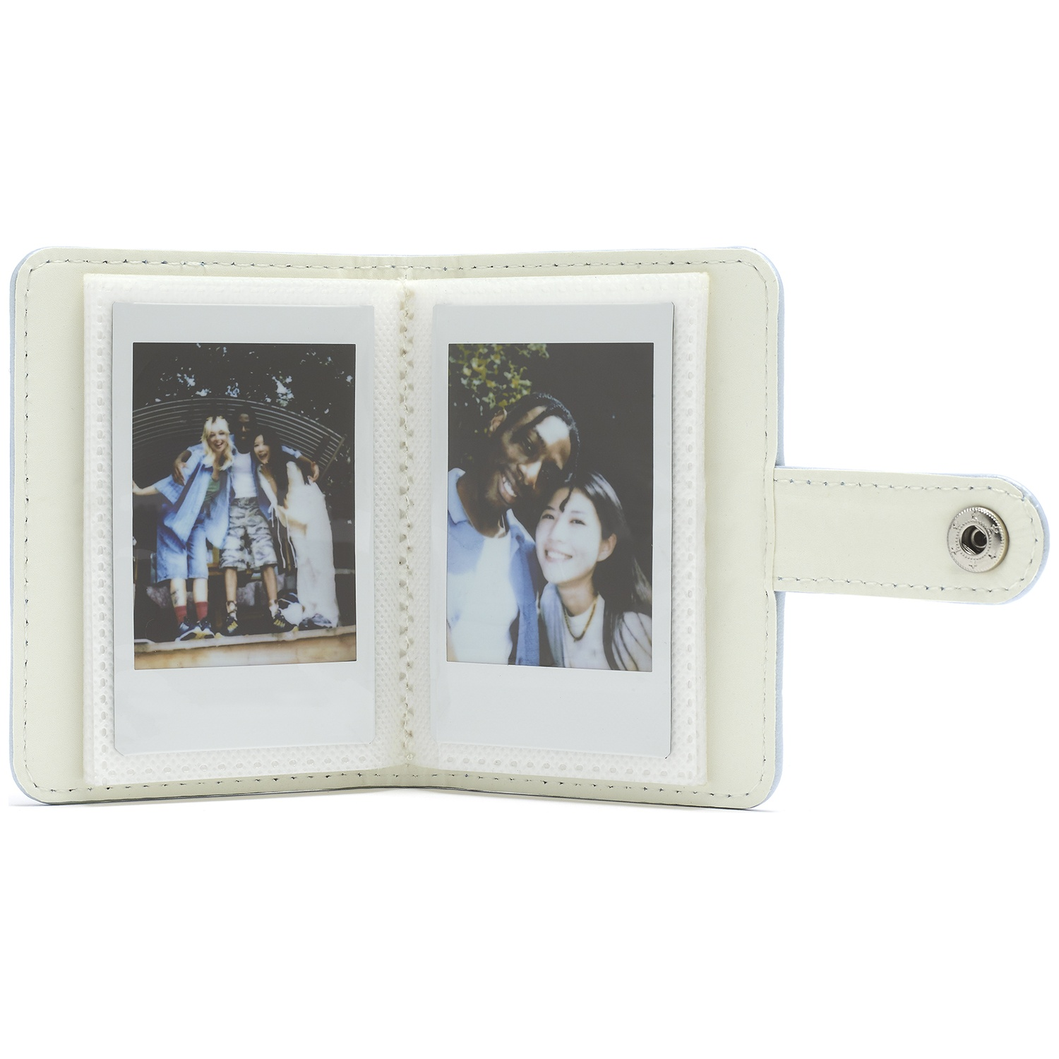 A light blue photo album holding two instant photos of people.
