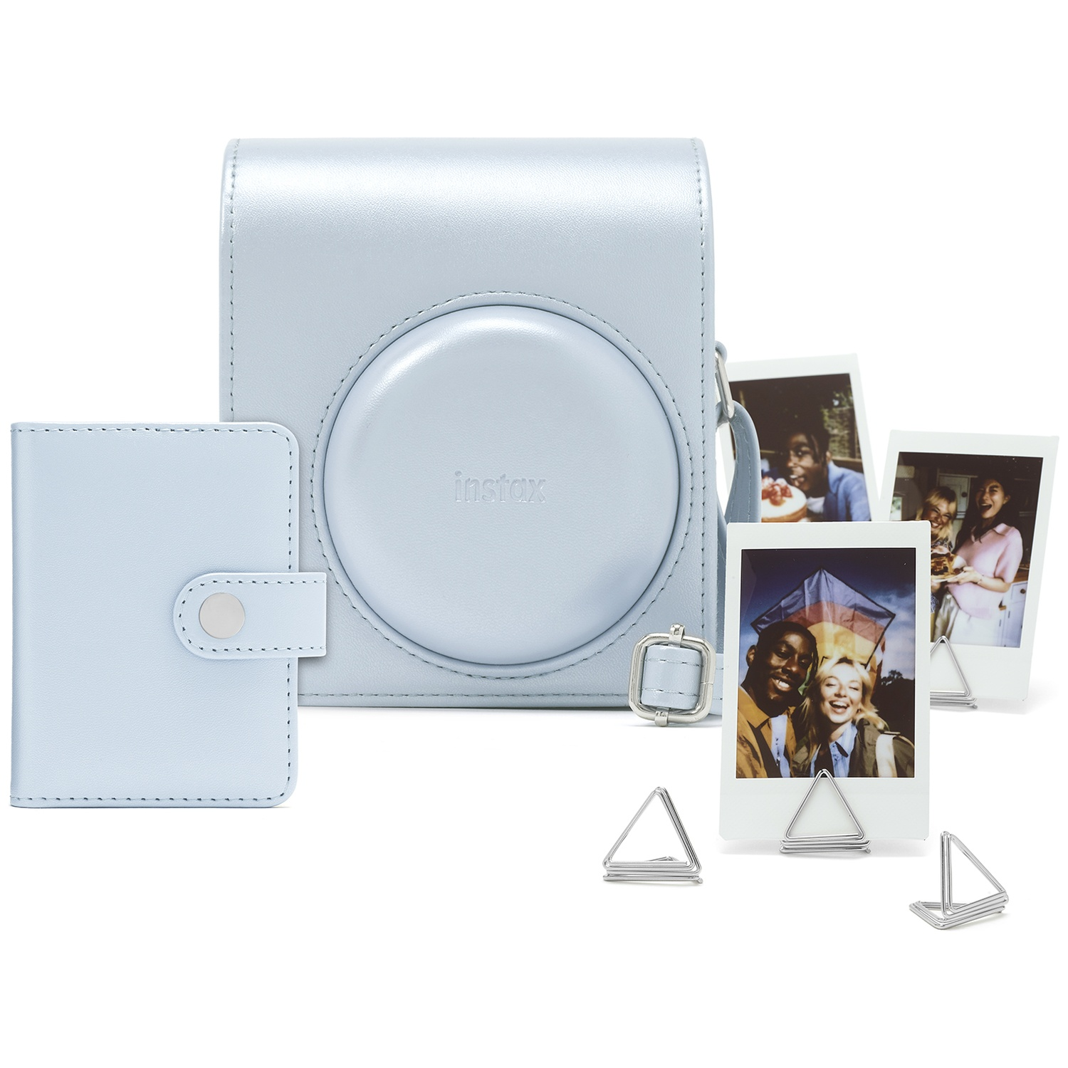 Light blue faux leather camera case, open photo album, and three photos on stands.