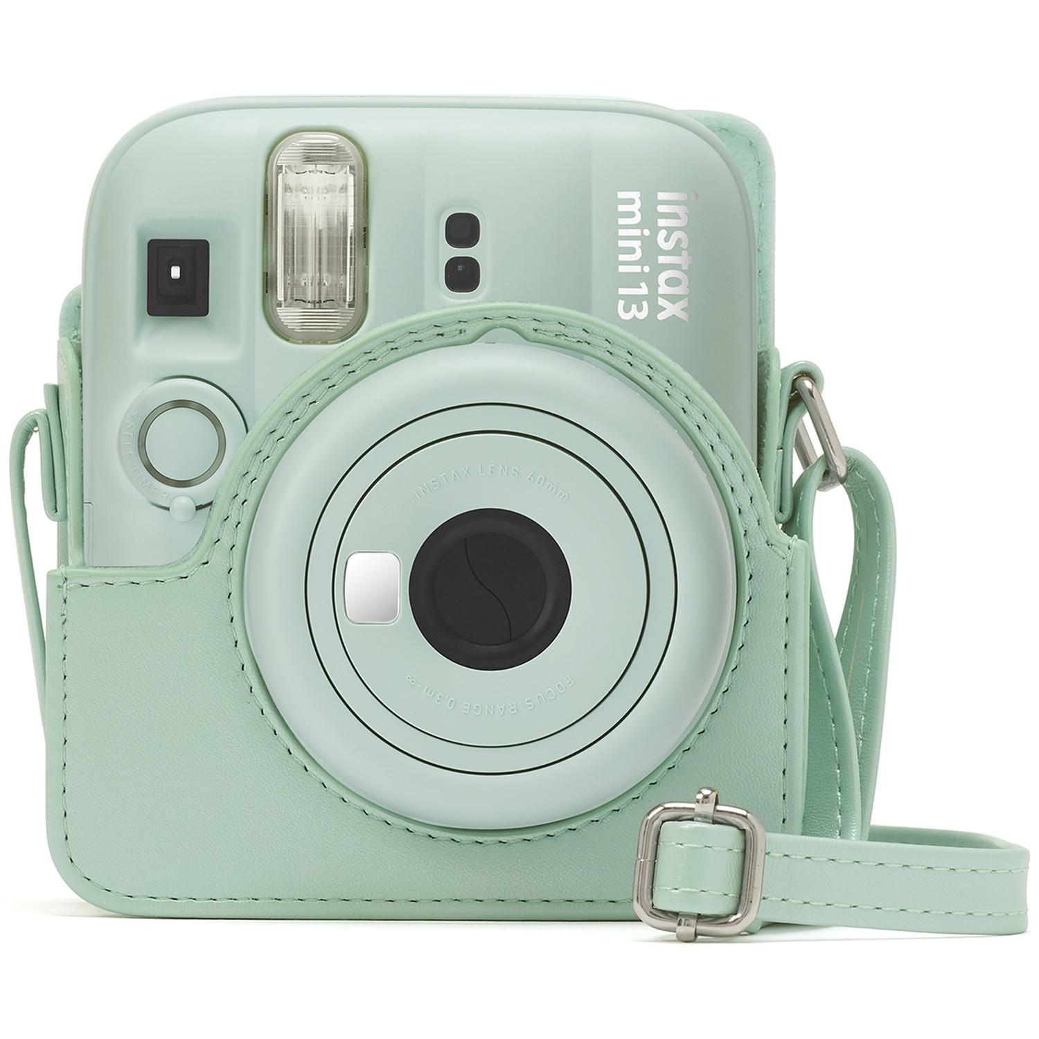 A light green instant camera with a matching case and strap.