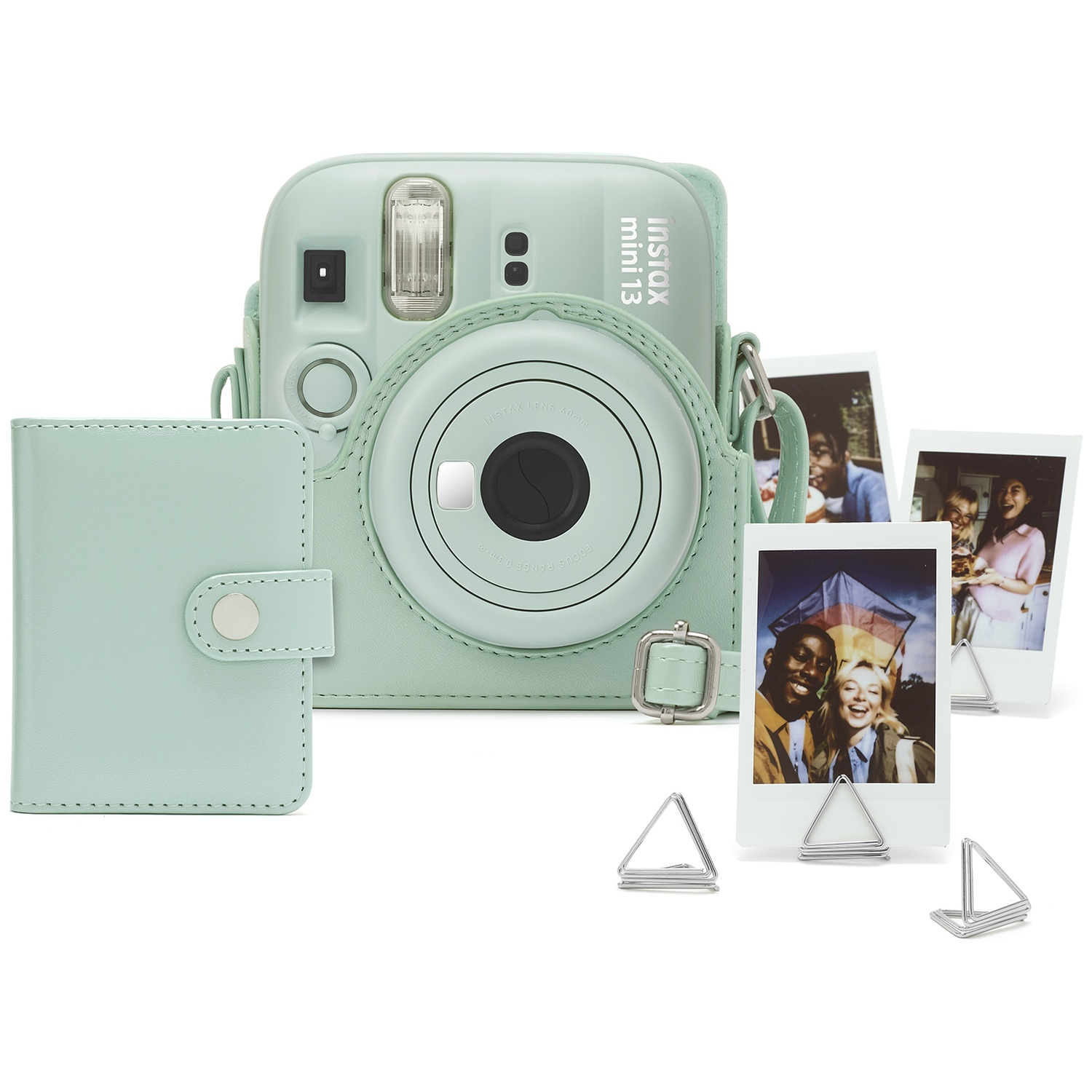 A mint green instant camera with matching case and three photos.