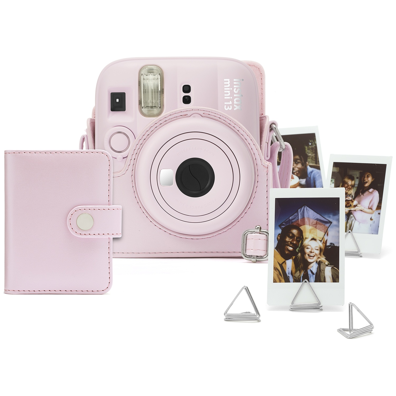 Pink Instax mini 13 camera with case, wallet, and photos on stands.