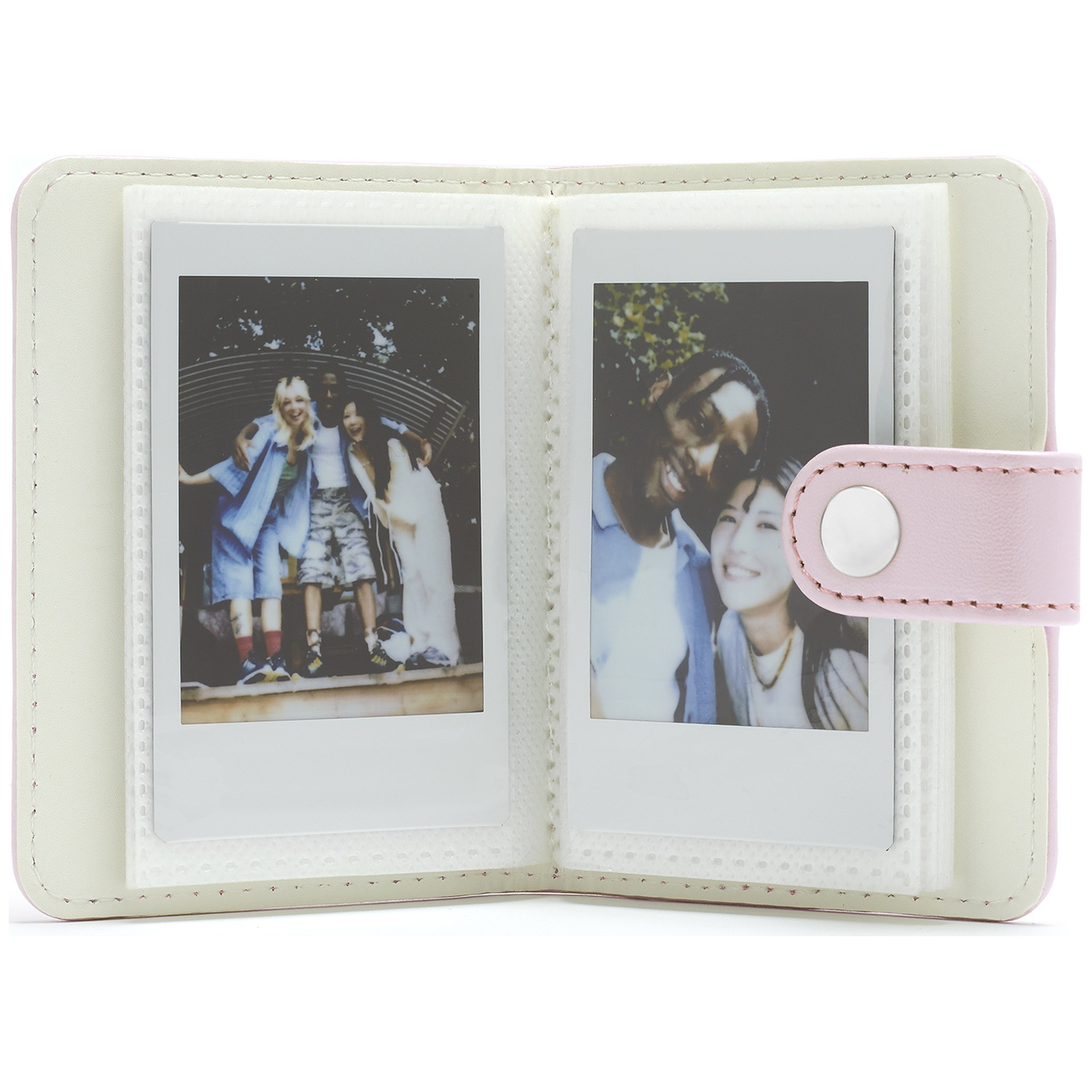 A pink photo album holding two pictures of people.