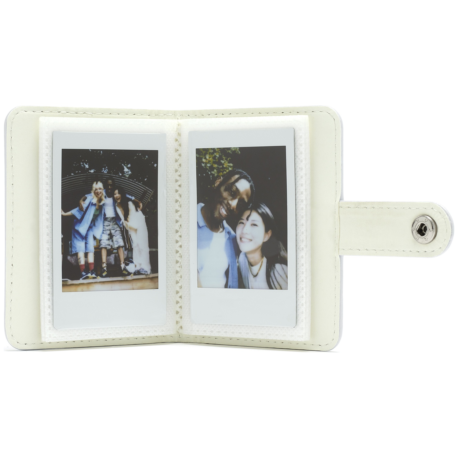 A white photo album with two instant photos of young people.