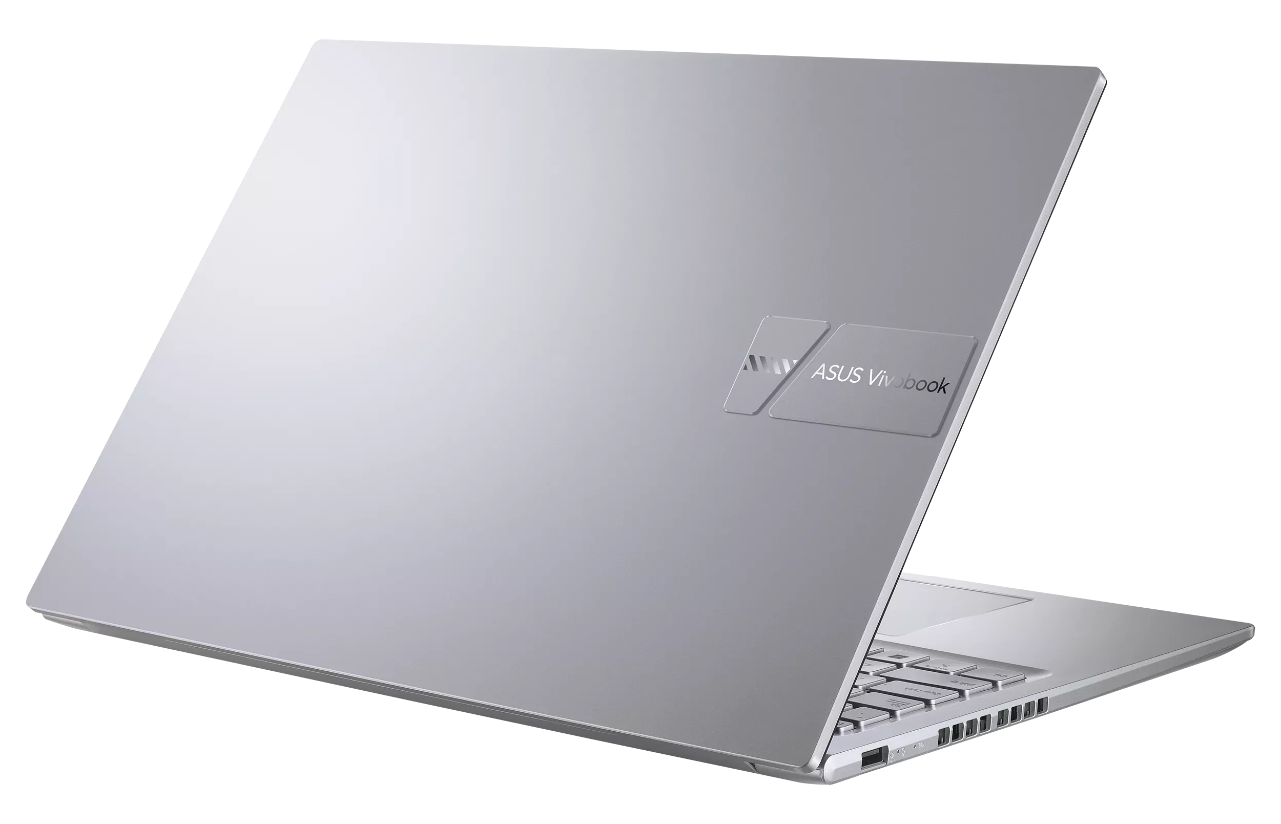 Srebrny laptop ASUS Vivobook z otwartą pokrywą, widoczna klawiatura.