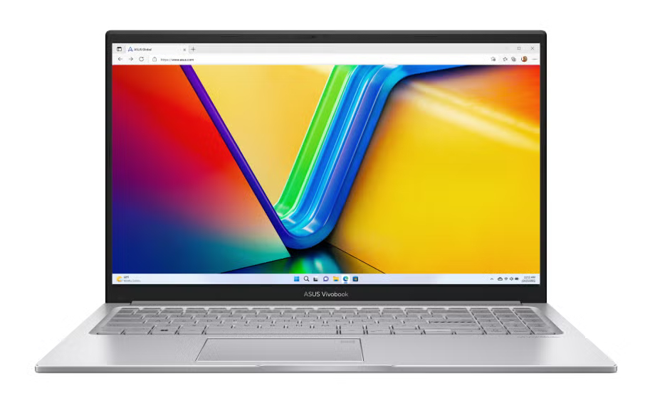 Srebrny laptop z kolorową tapetą na ekranie.