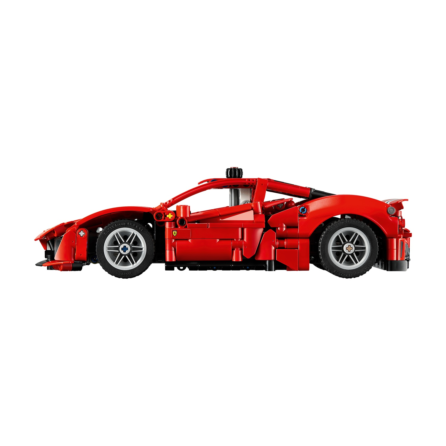 Modellino auto Ferrari Lego Technic rosso con ruote e carrozzeria dettagliate.