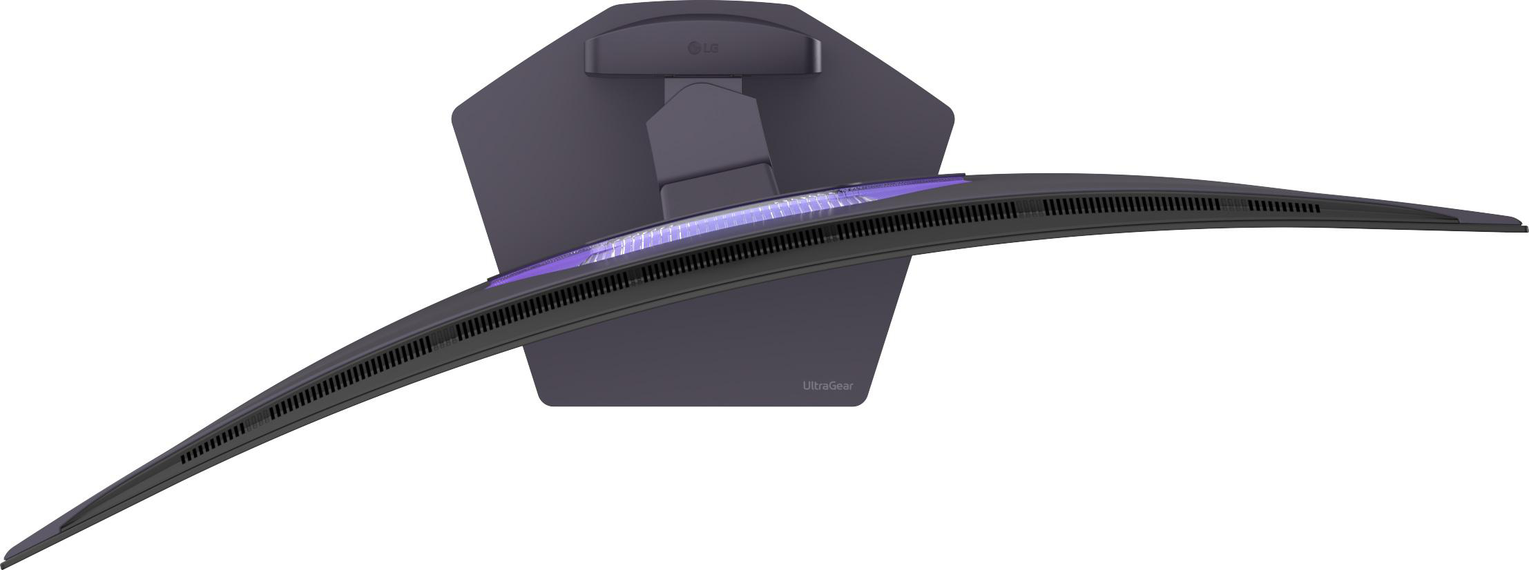 Ein dunkler, gebogener LG UltraGear Monitor von oben mit lilafarbener Beleuchtung.