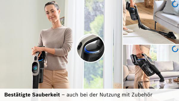 Frau mit Akku-Staubsauger, Nahaufnahme des Griffs, Staubsaugen im Wohnzimmer.