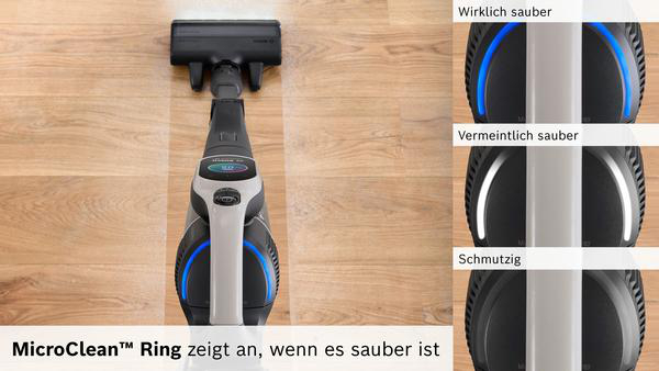 Ein Staubsauger auf einem Holzboden, der den MicroClean Ring zeigt.