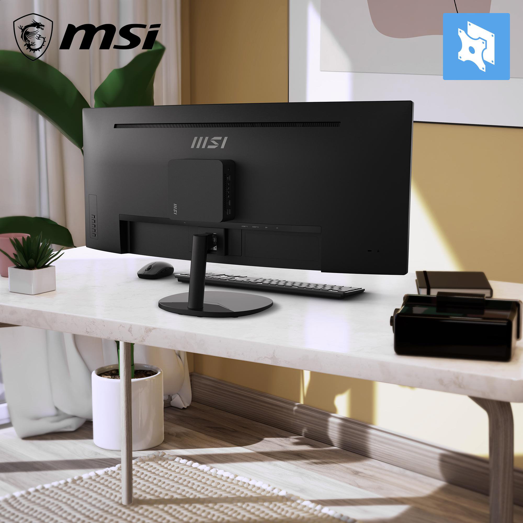 MSI-Desktop-PC mit Monitor, Tastatur und Maus auf einem Schreibtisch.