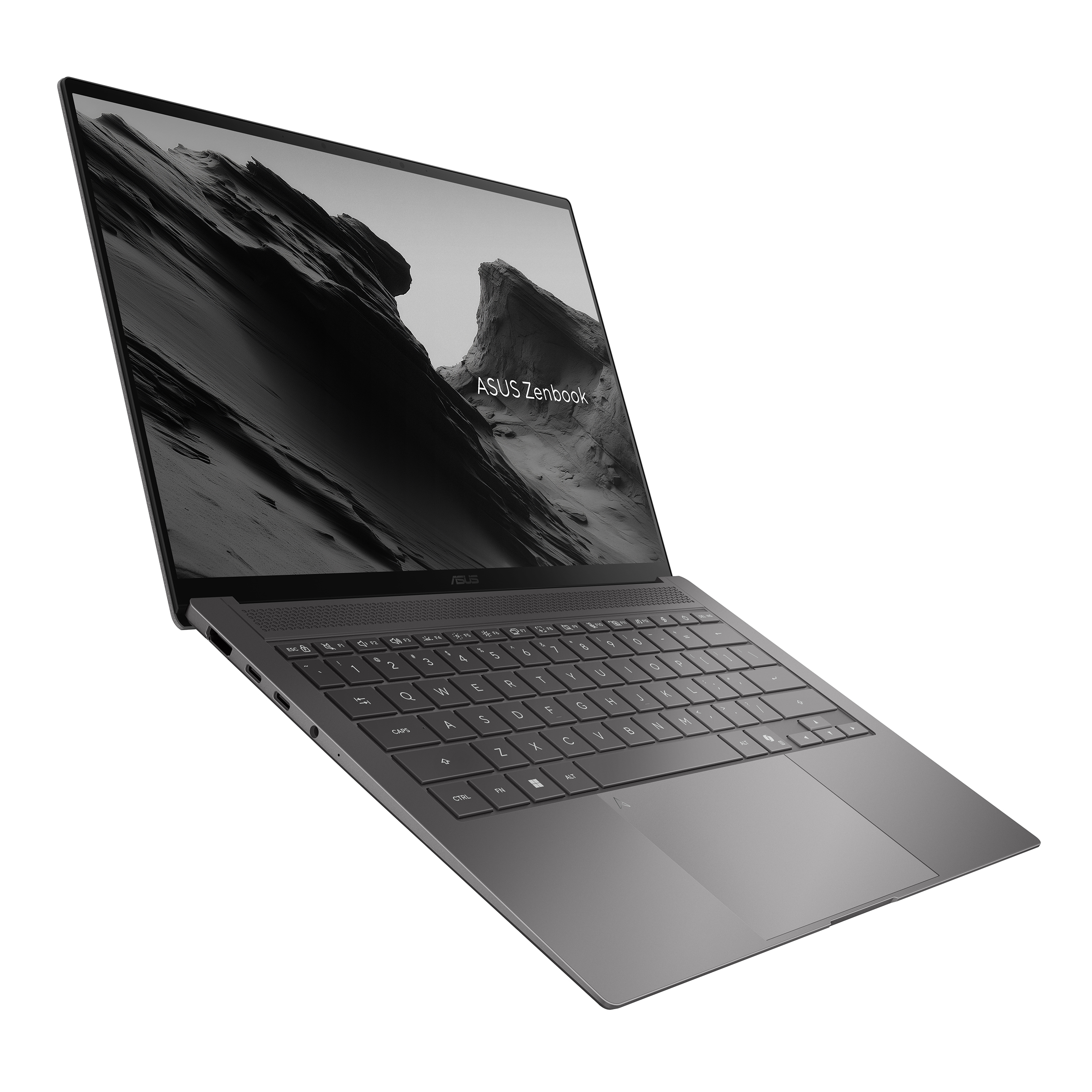 Koyu gri bir ASUS Zenbook dizüstü bilgisayar eğik duruyor, klavyesini ve gri, dokulu soyut bir görüntü gösteren ekranını sergiliyor.