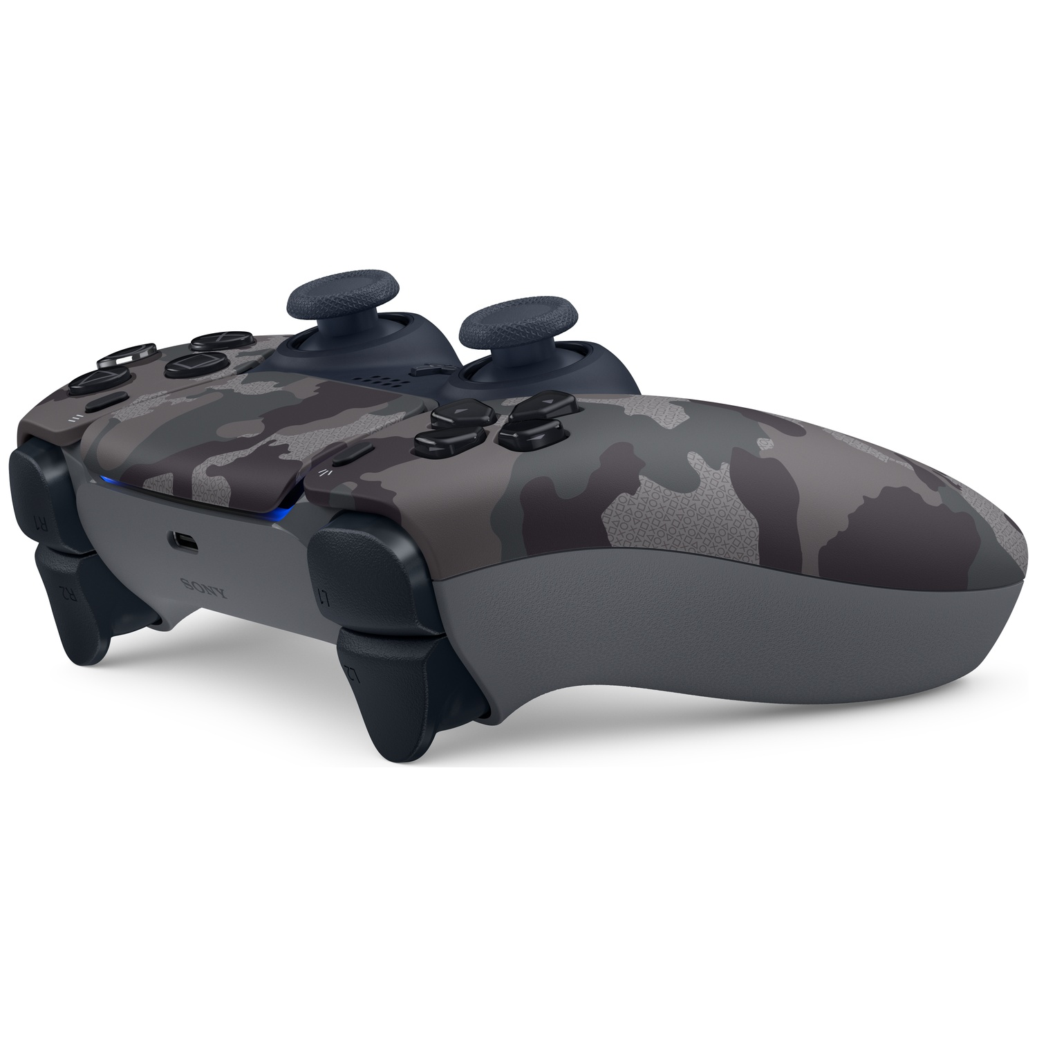 Manette grise camouflage avec boutons et joysticks noirs.