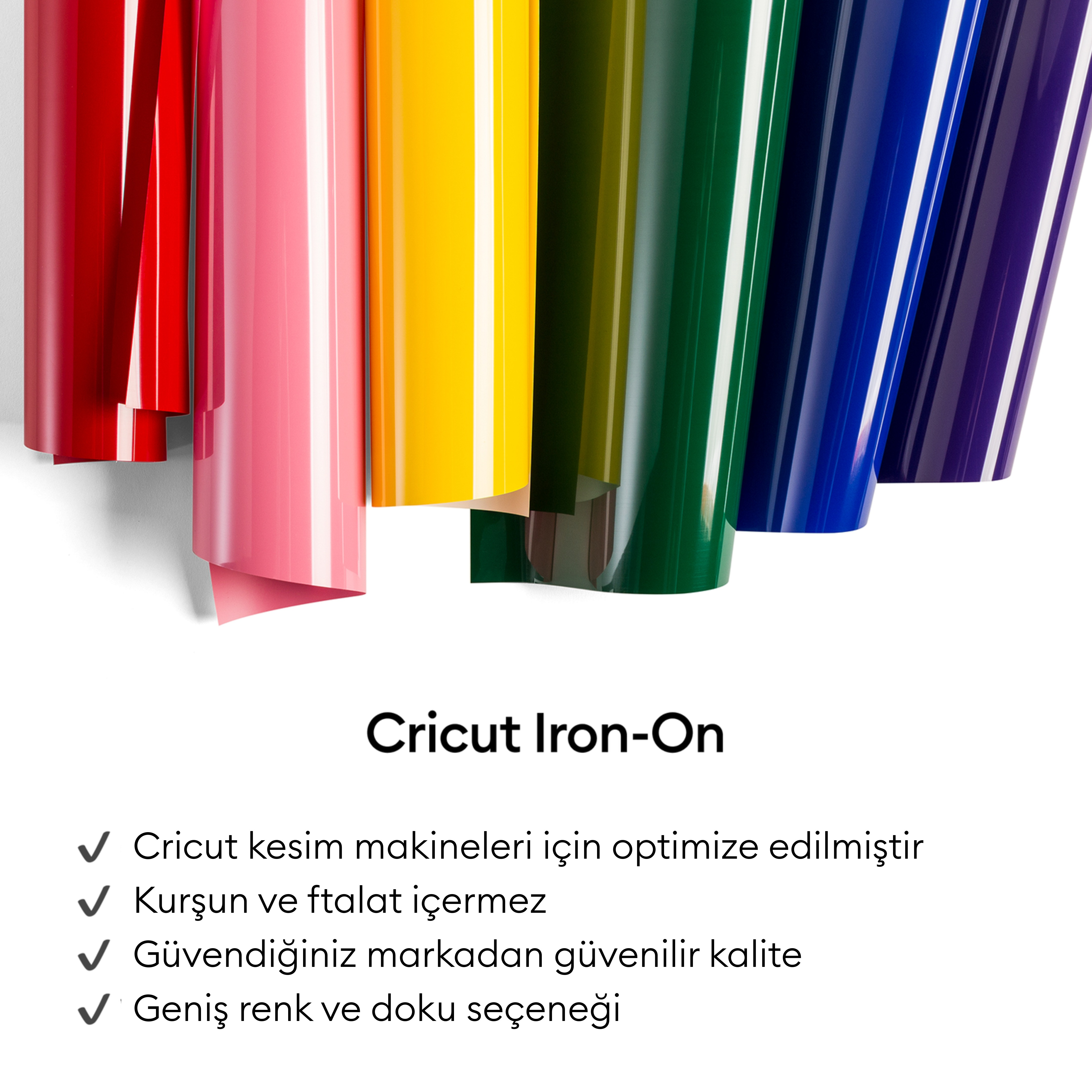 Renkli vinil folyo ruloları, üst üste dizilmiş ve yakından.