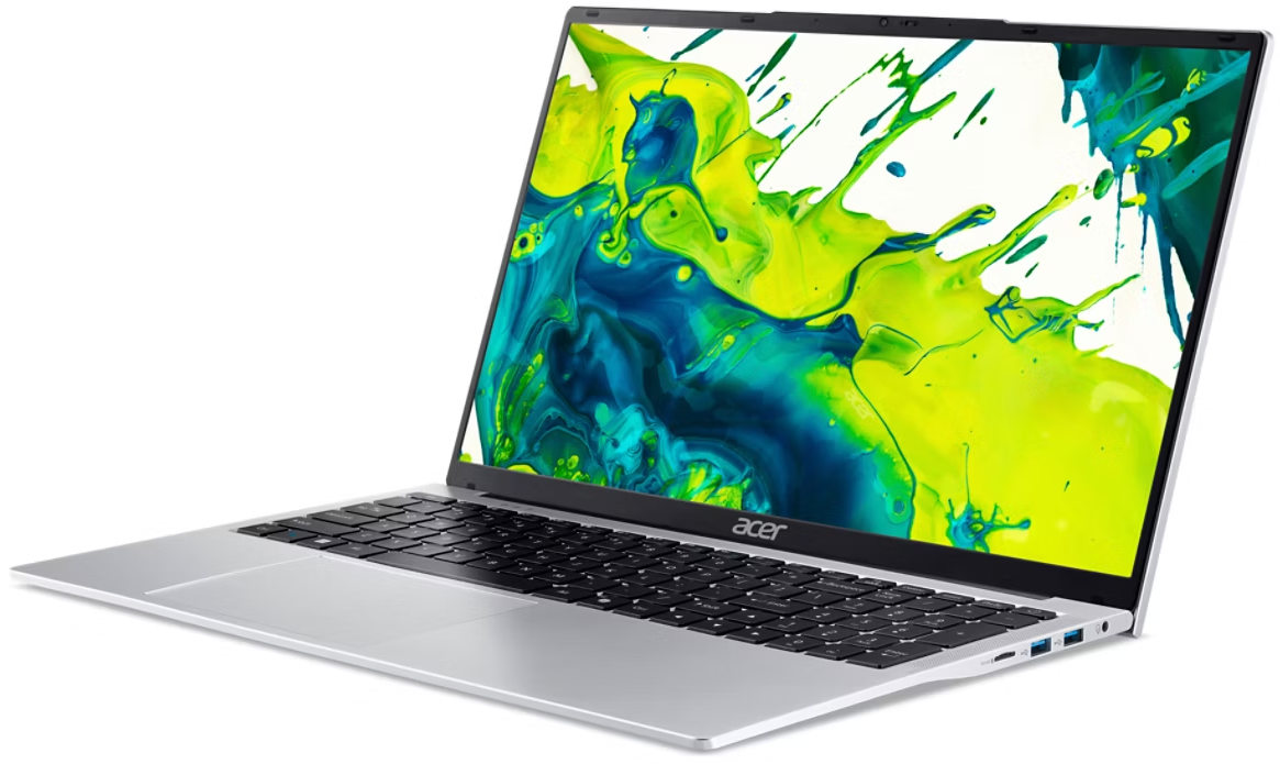 Egy nyitott ezüst laptop színes absztrakt háttérképet jelenít meg. Billentyűzet és portok láthatók.