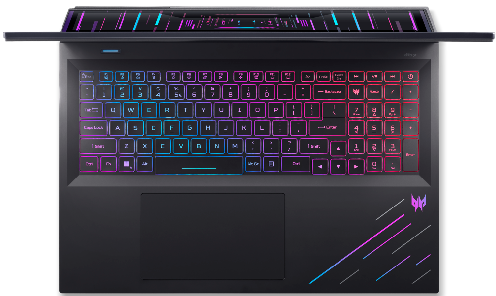 Fekete laptop szivárványos, háttérvilágítású billentyűzettel.