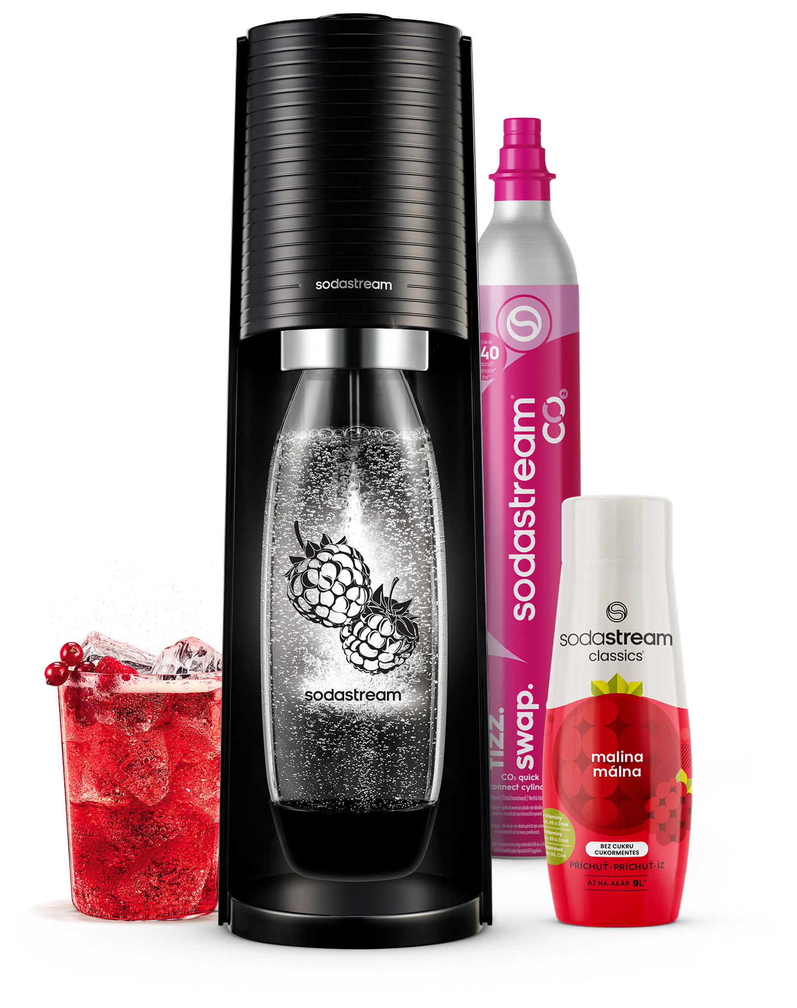 Egy Sodastream gép CO2-palackkal, málnaszörppel és egy pohár vörös itallal.