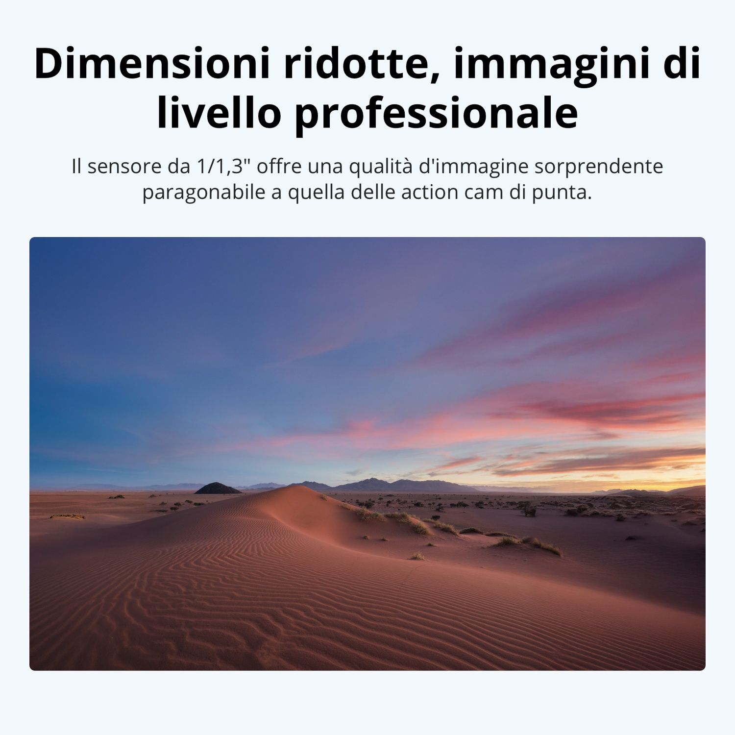 Dune di sabbia desertiche al tramonto con cielo drammatico.