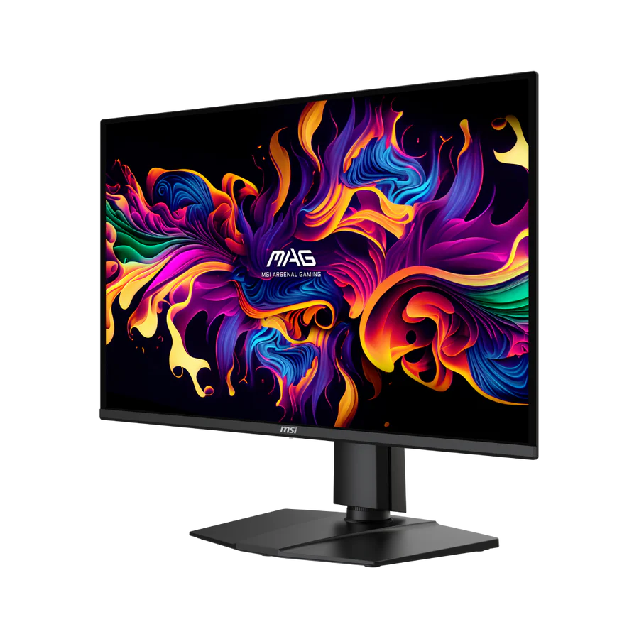 Un monitor negro muestra un diseño abstracto y vibrante de formas coloridas y fluidas sobre fondo negro.