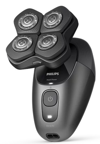 Ciemny golarka Philips z czterema obrotowymi głowicami tnącymi i przyciskiem zasilania.