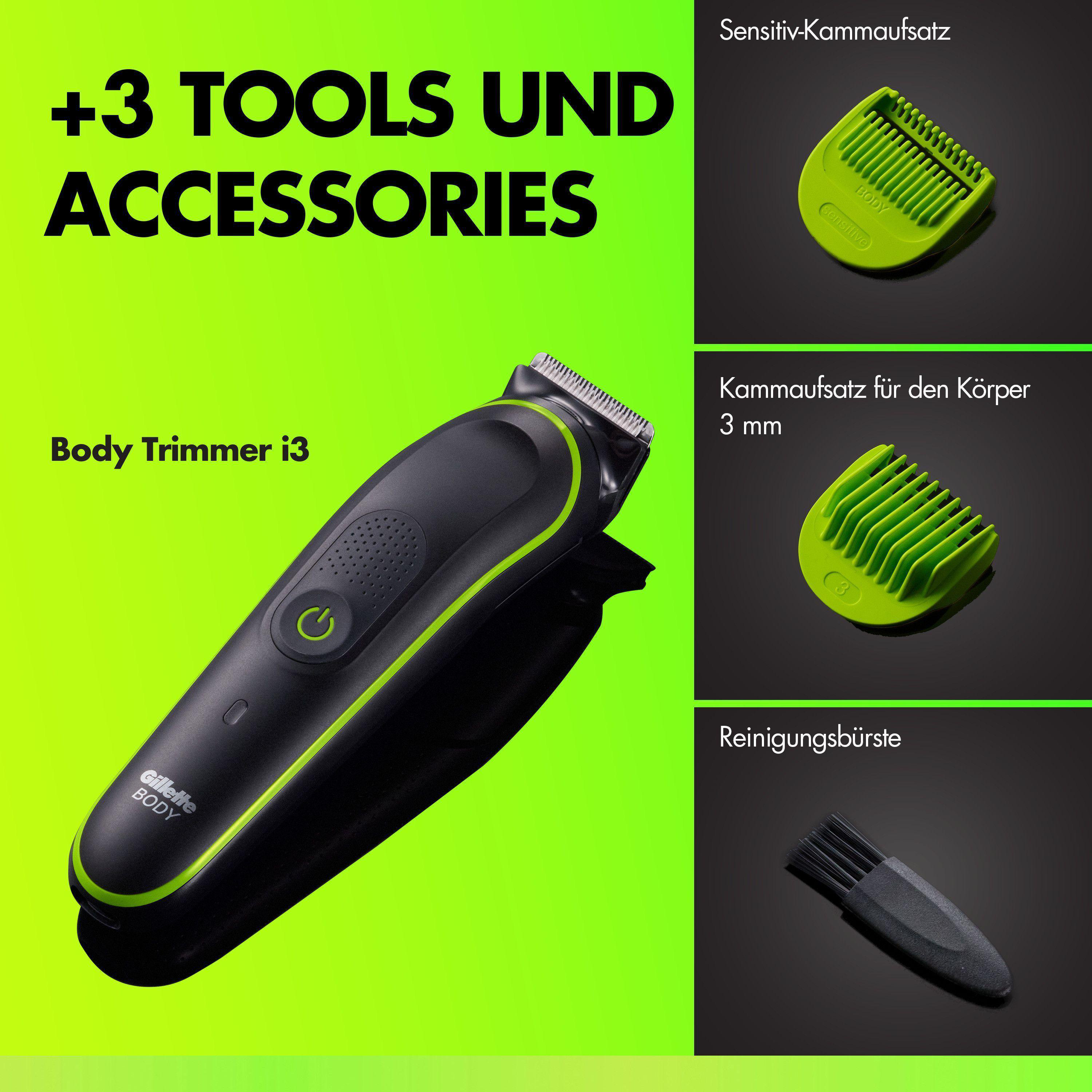 Ein schwarzer Body Trimmer mit Zubehör: 3 Aufsätze auf grünem Hintergrund.