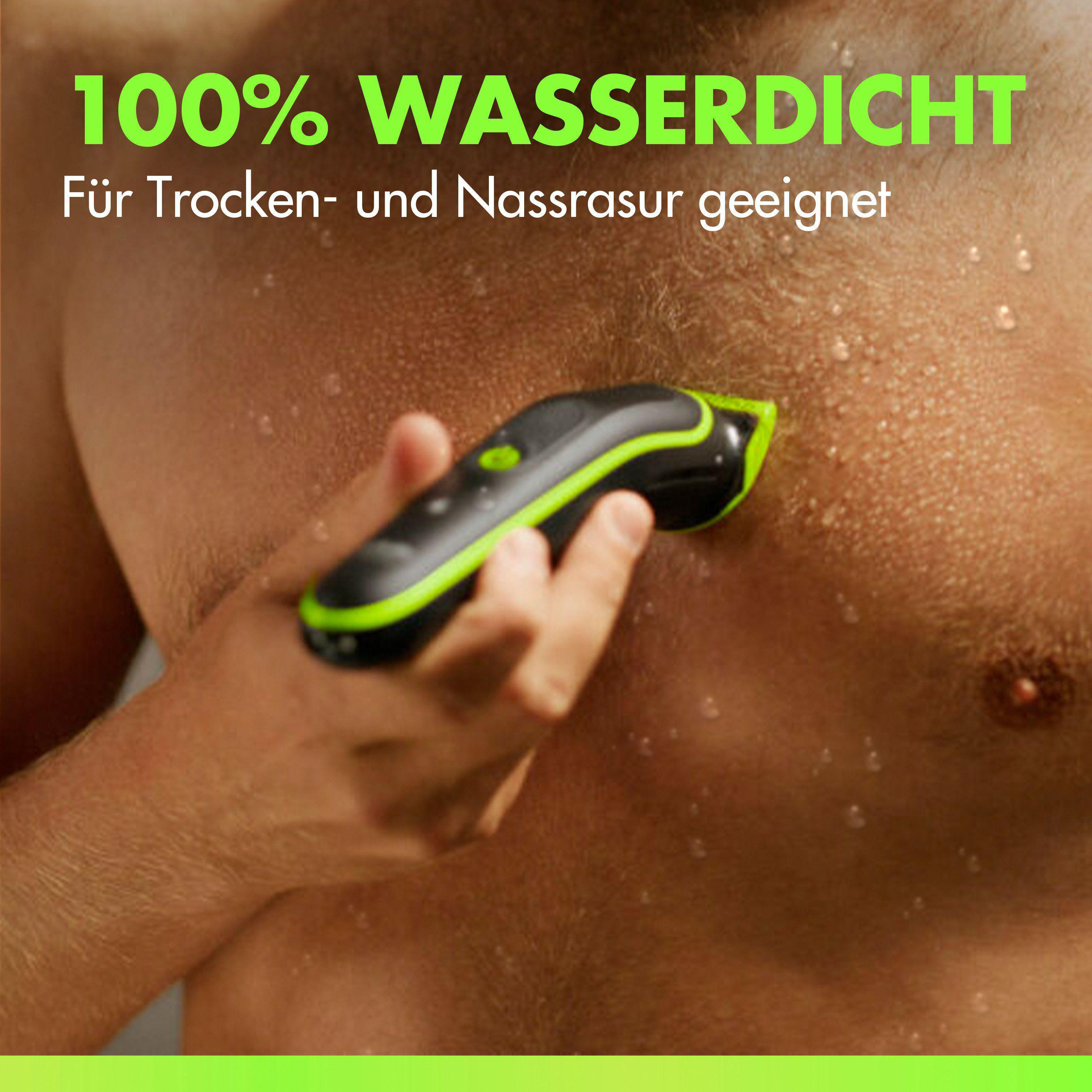 Ein Mann rasiert seine Brust mit einem schwarzen und grünen Elektrorasierer.
