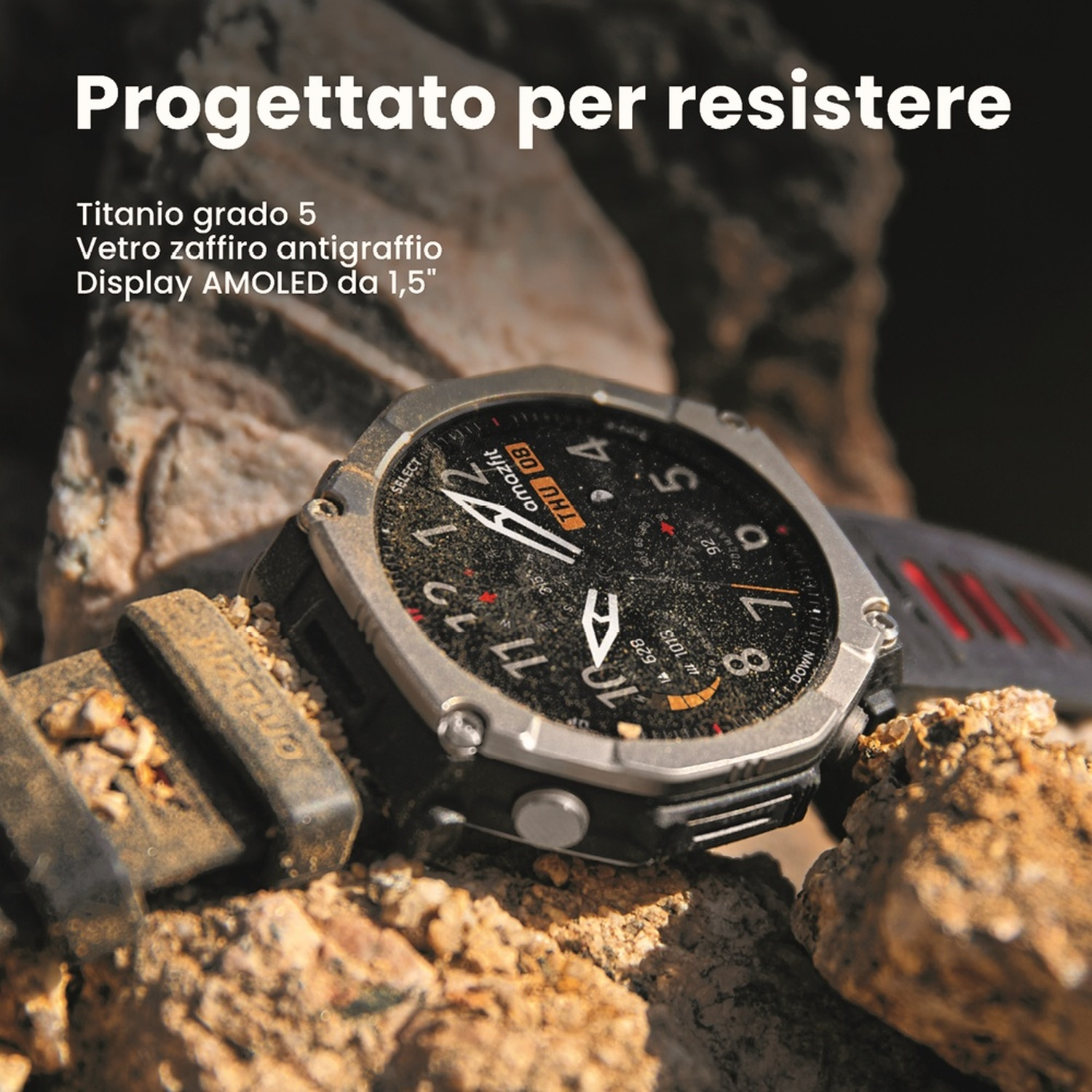 Un robusto smartwatch con lunetta in titanio su rocce. Display AMOLED.