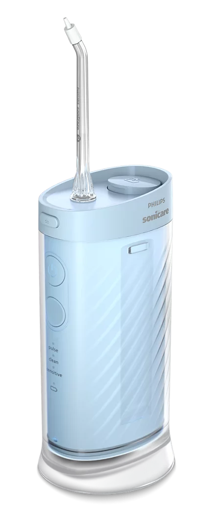 Jasnoniebieska podstawa irygatora Philips Sonicare z przezroczystą dyszą.
