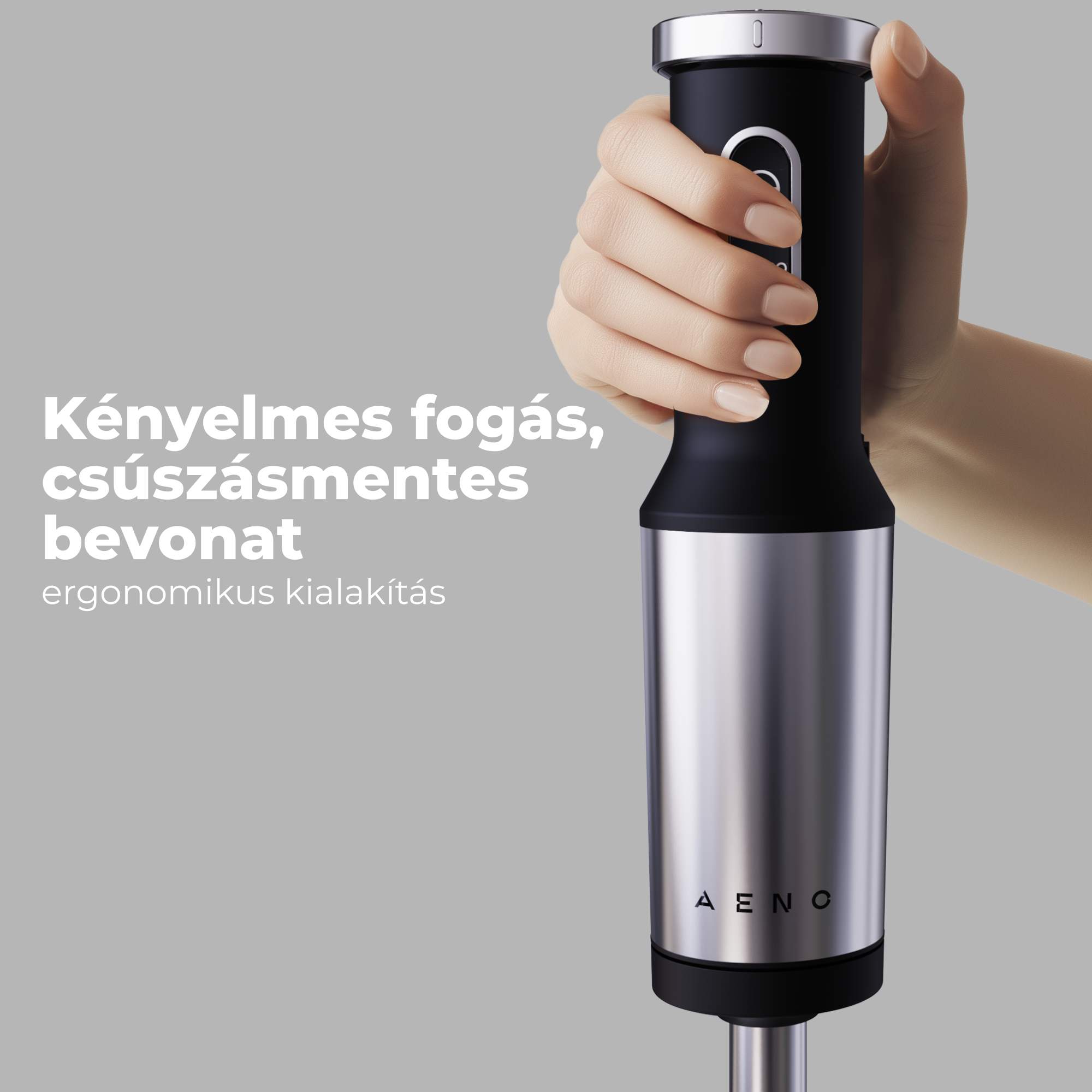 Egy kéz egy fekete és ezüst botmixert tart ergonomikus markolattal.
