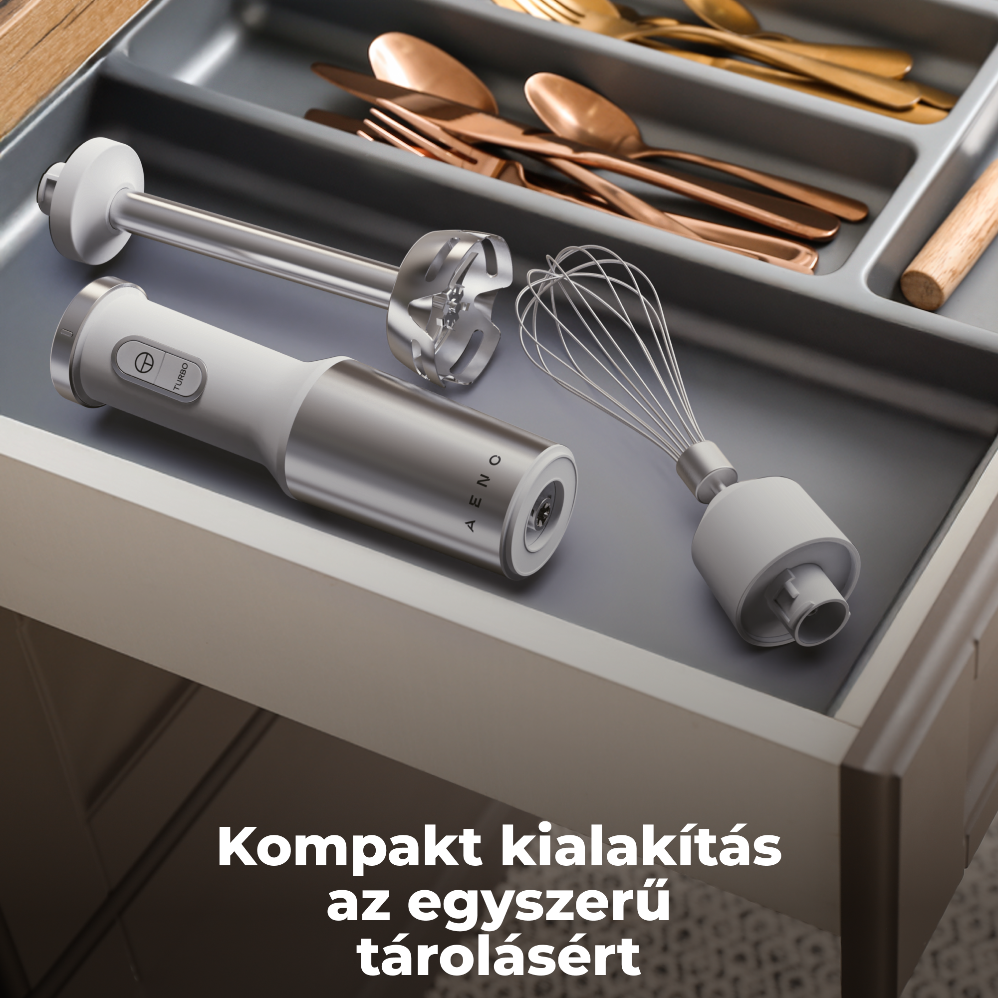 Fehér és ezüst kézi mixer habverővel egy fiókban.