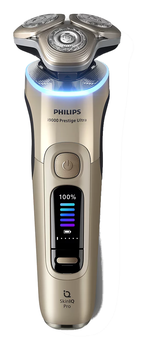 Złota golarka Philips i9000 Prestige Ultra z niebieskim światłem i cyfrowym wyświetlaczem.