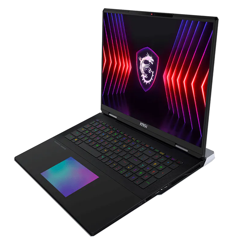 Czarny laptop z podświetlaną klawiaturą i logo MSI na ekranie.