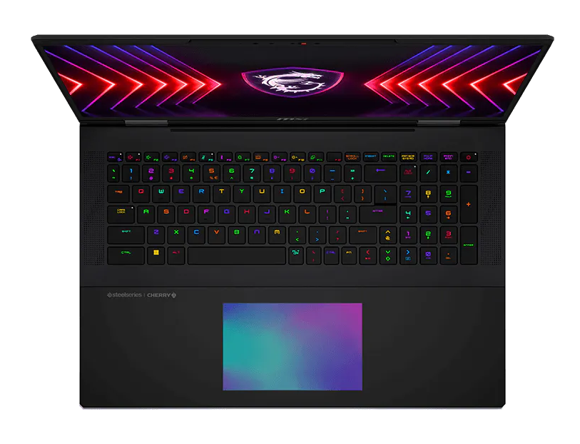 Otwarty czarny laptop z podświetlaną klawiaturą i kolorową grafiką ekranu.